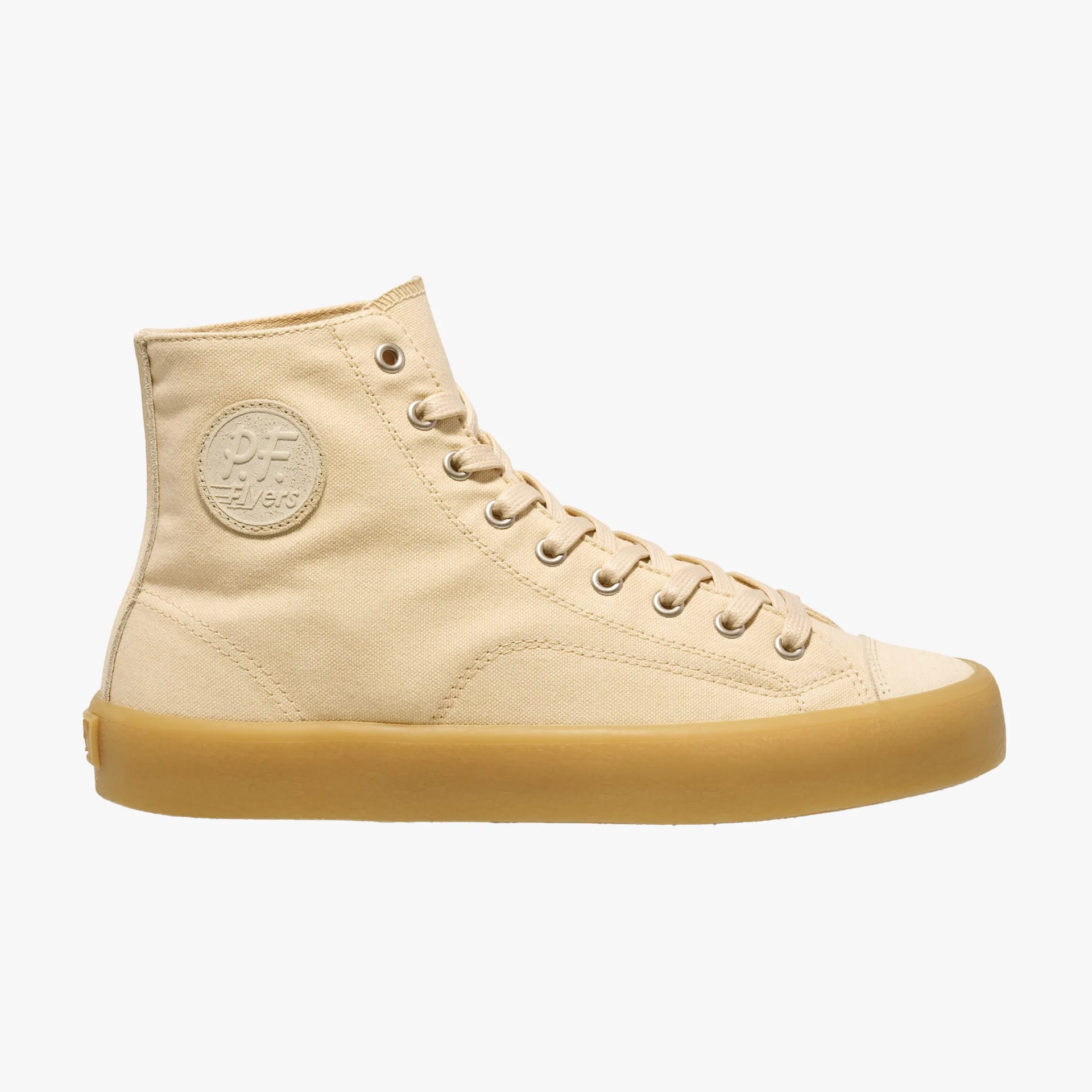 Beige high-top canvas sneaker with beige laces and gum rubber sole, featuring a circular patch logo on the side.