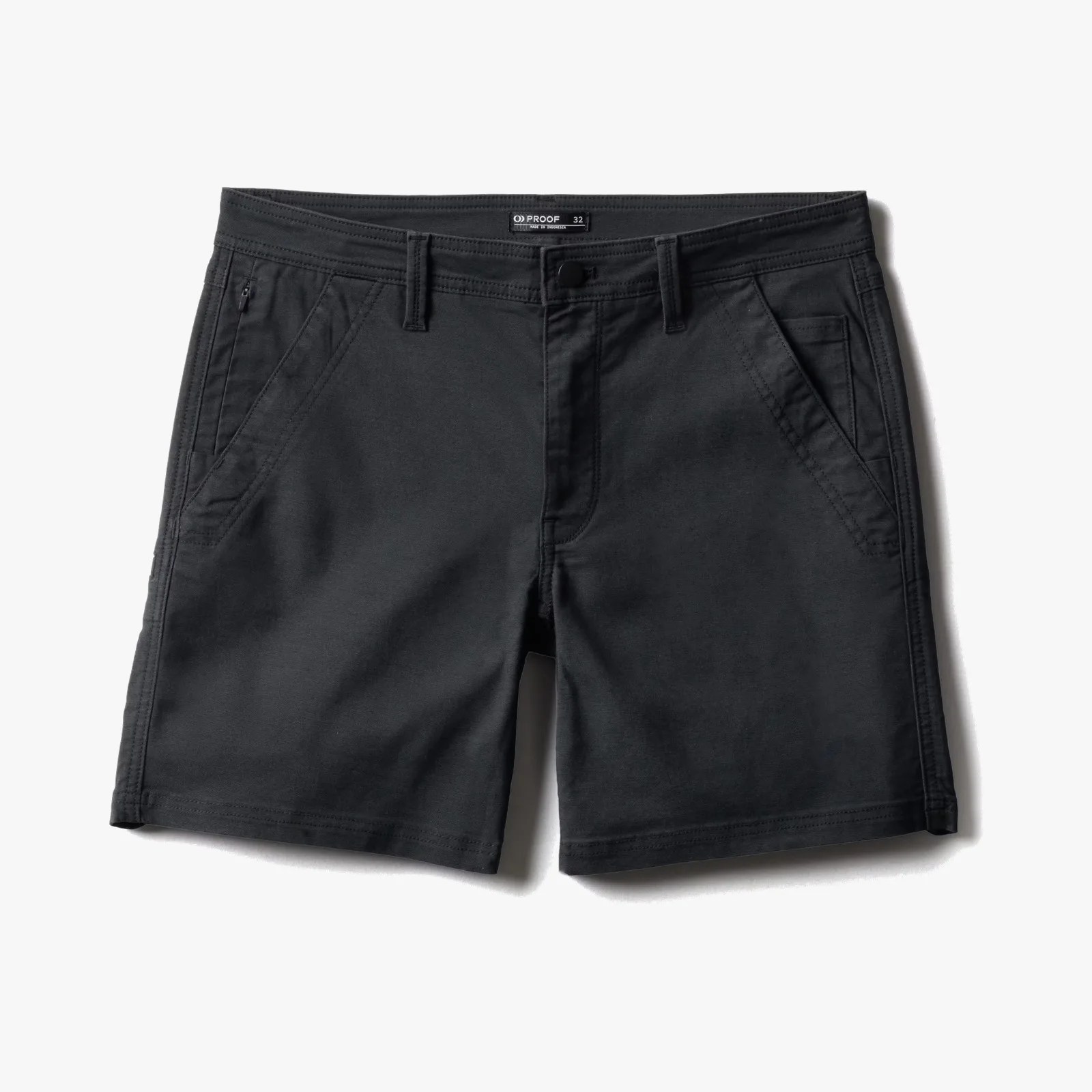 Black casual shorts with front pockets and belt loops laid flat on a white surface.