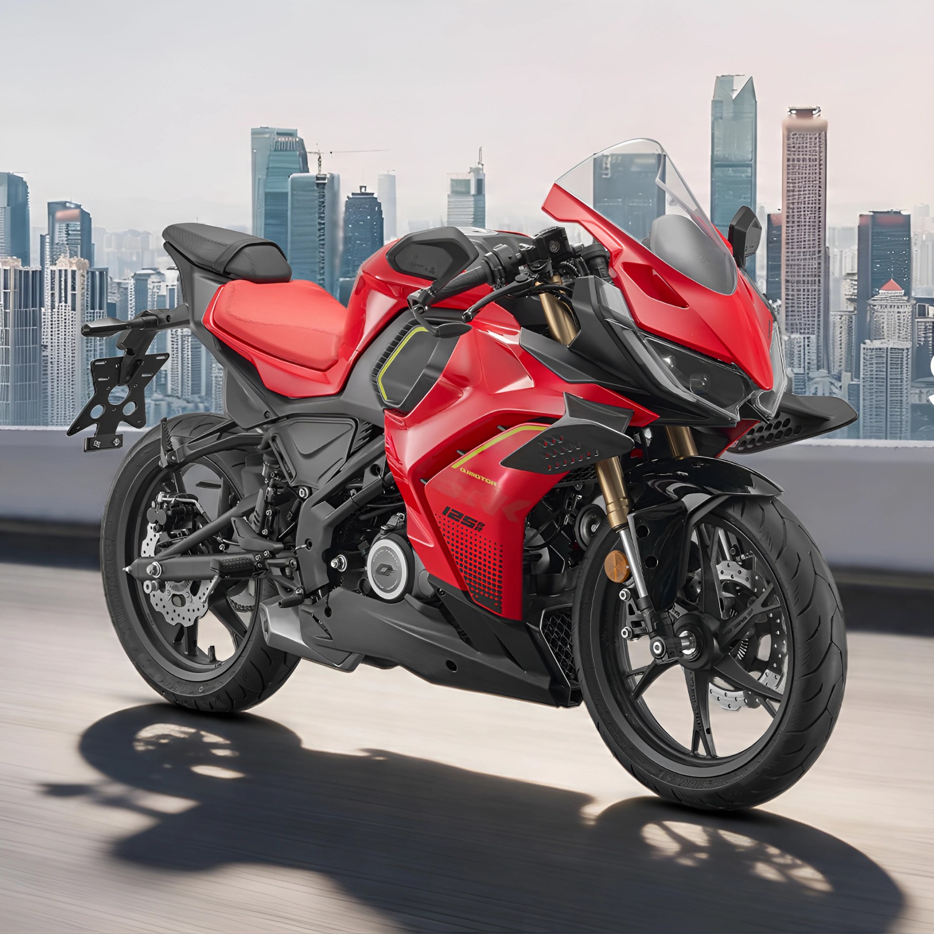 Red and black sport motorcycle with aerodynamic fairings and city skyline in the background.