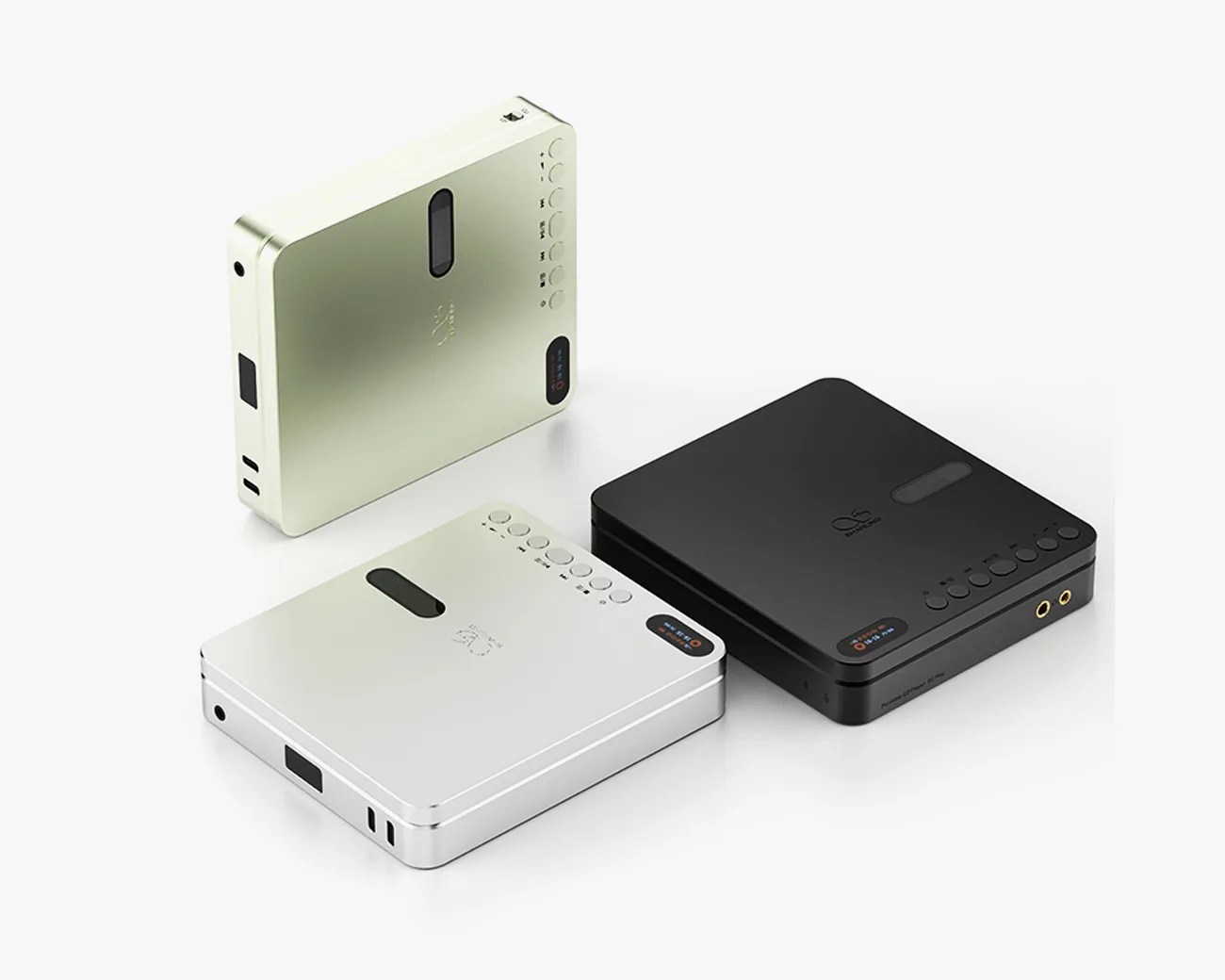 Three compact digital audio players in silver, gold, and black with buttons and display screens on a white background.