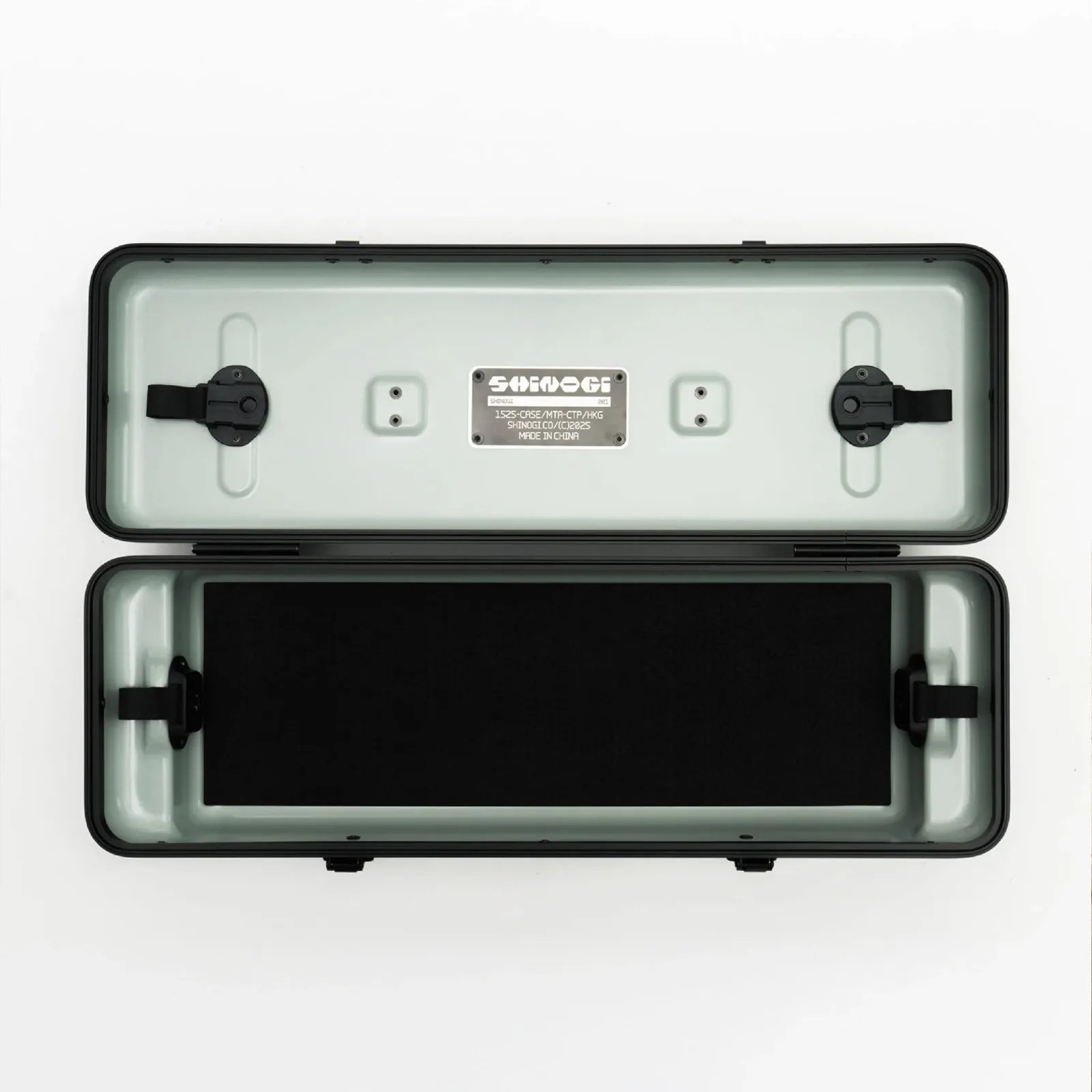 Open rectangular hard case with light gray interior and black foam padding inside.