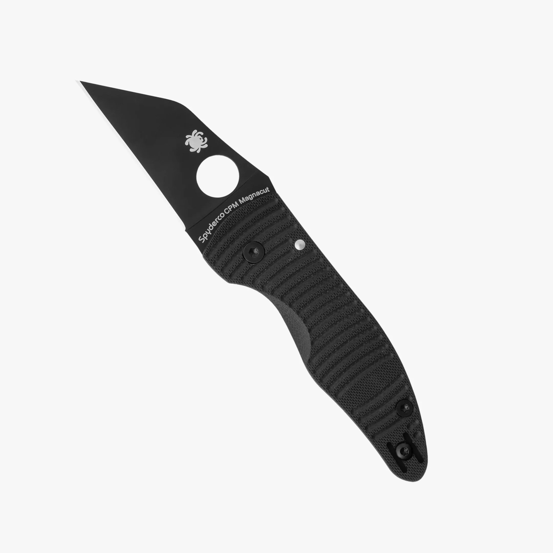 Black Spyderco CPM Magnacut folding knife with textured handle and partially serrated blade.
