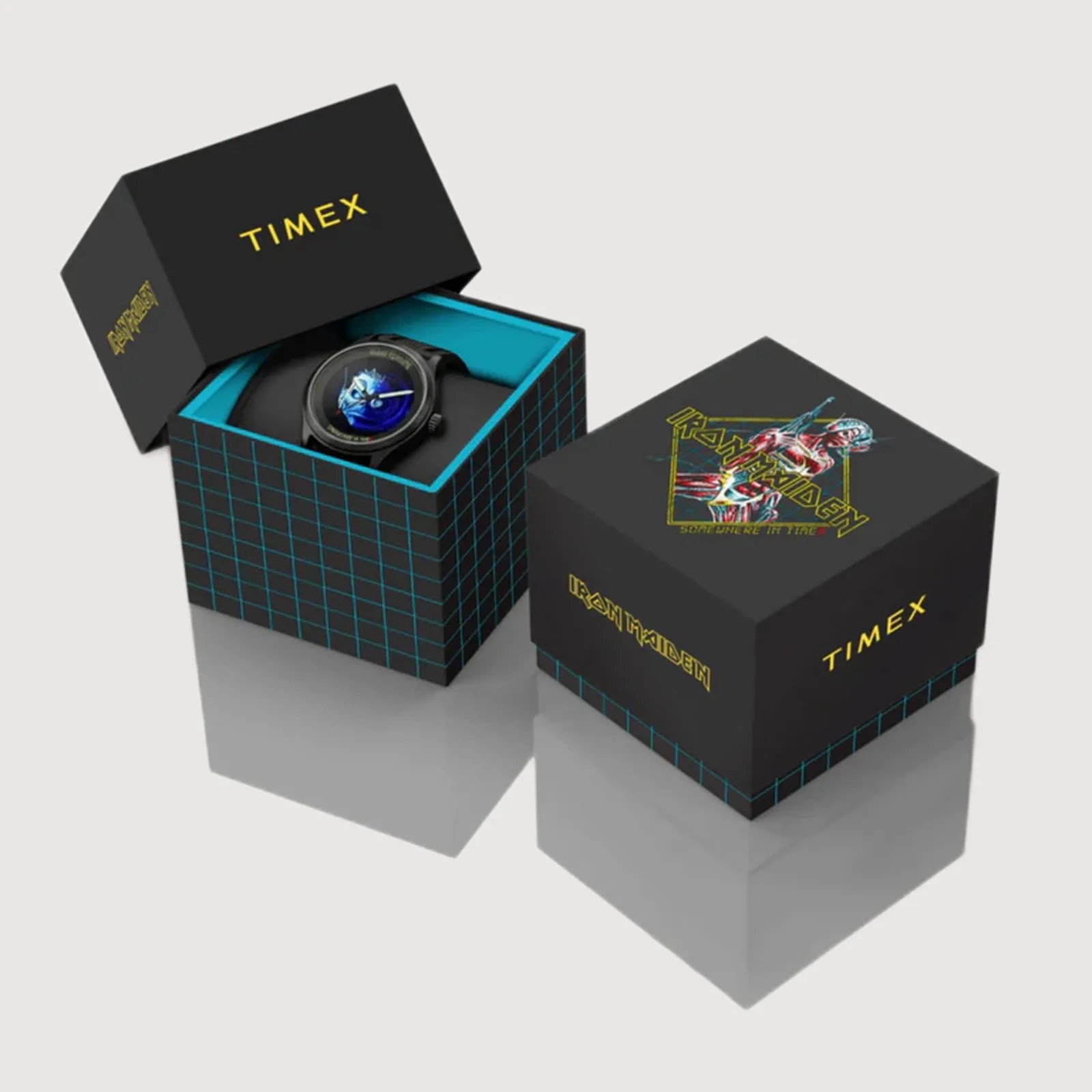 Black Timex watch with blue and white graphic dial in a black and blue grid-patterned Iron Maiden themed box.