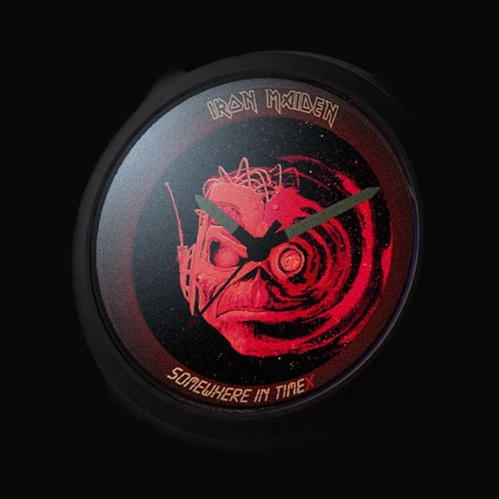 Round black watch face with red graphic of a cyborg skull and "Iron Maiden" and "Somewhere in Time" text.