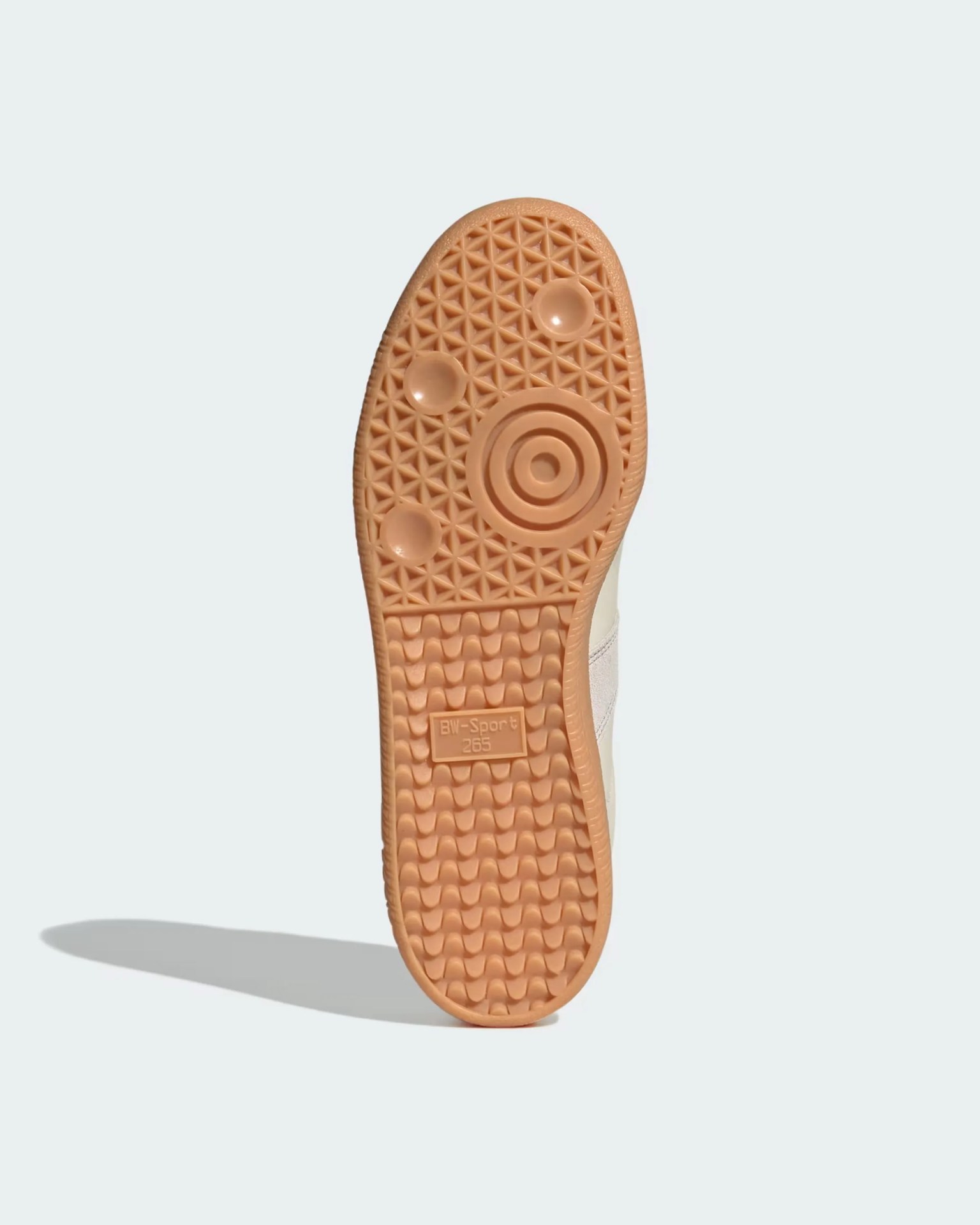 Light brown rubber sole of a shoe with circular and geometric tread patterns and "BW-Sport 265" text.