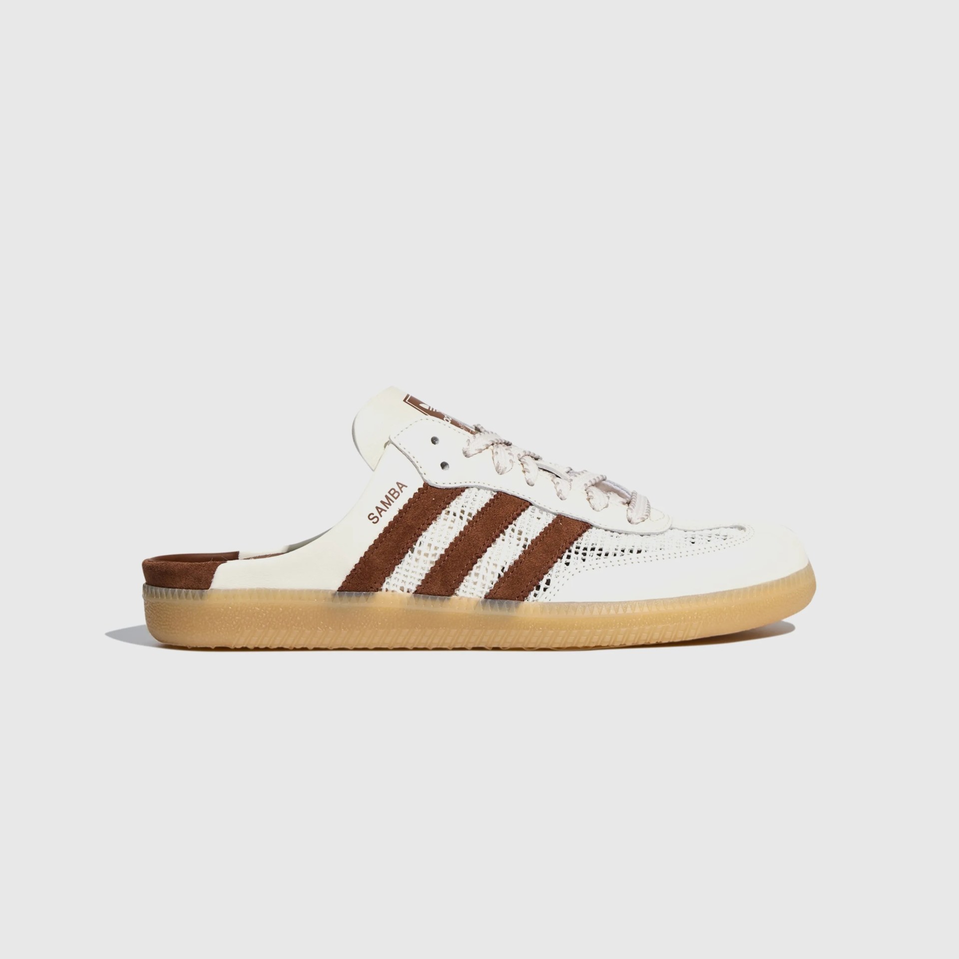 White and brown Adidas Samba mule sneaker with mesh and suede stripes and gum sole.