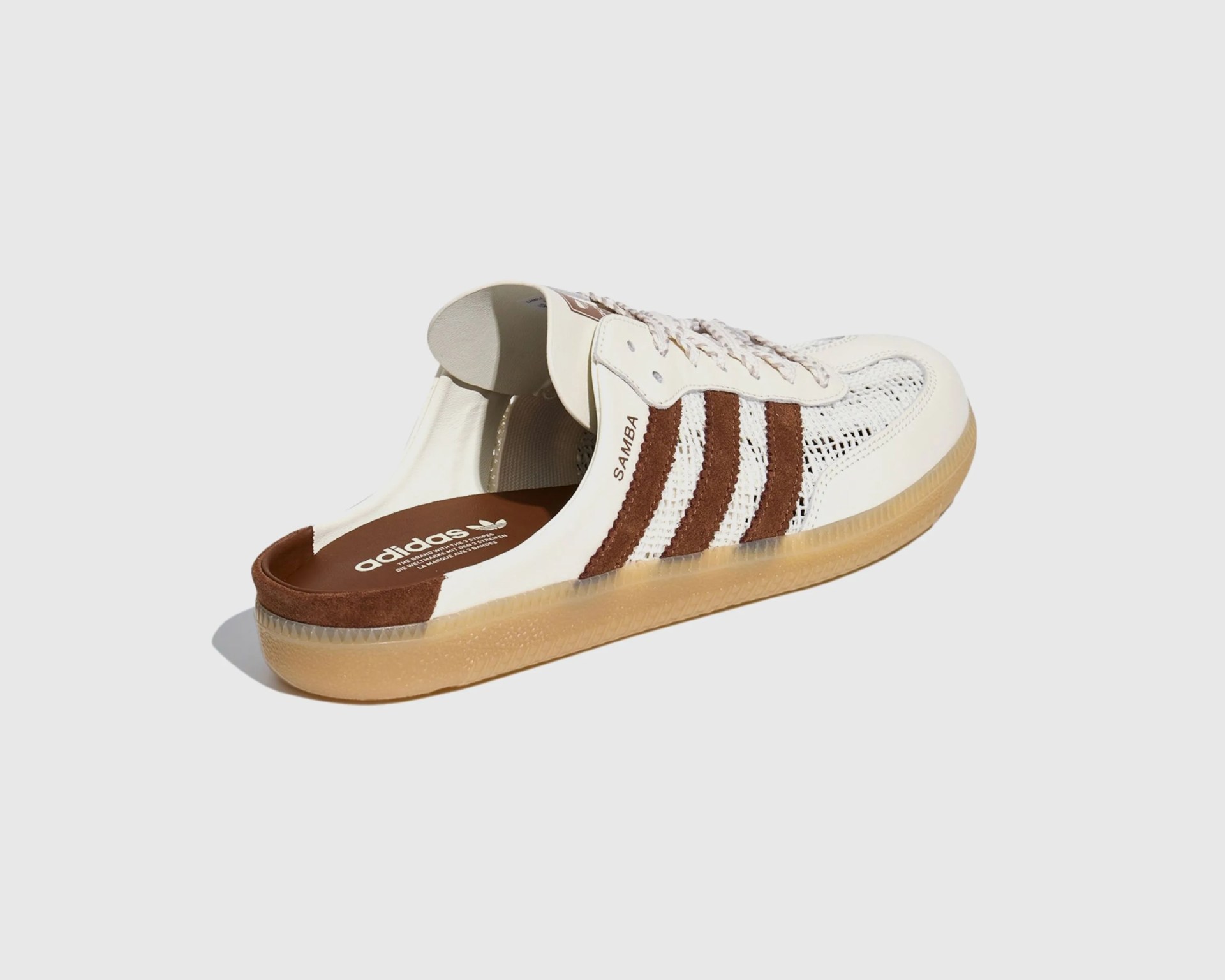 White and brown Adidas Samba sneaker with mesh upper and gum sole viewed from the side and back.