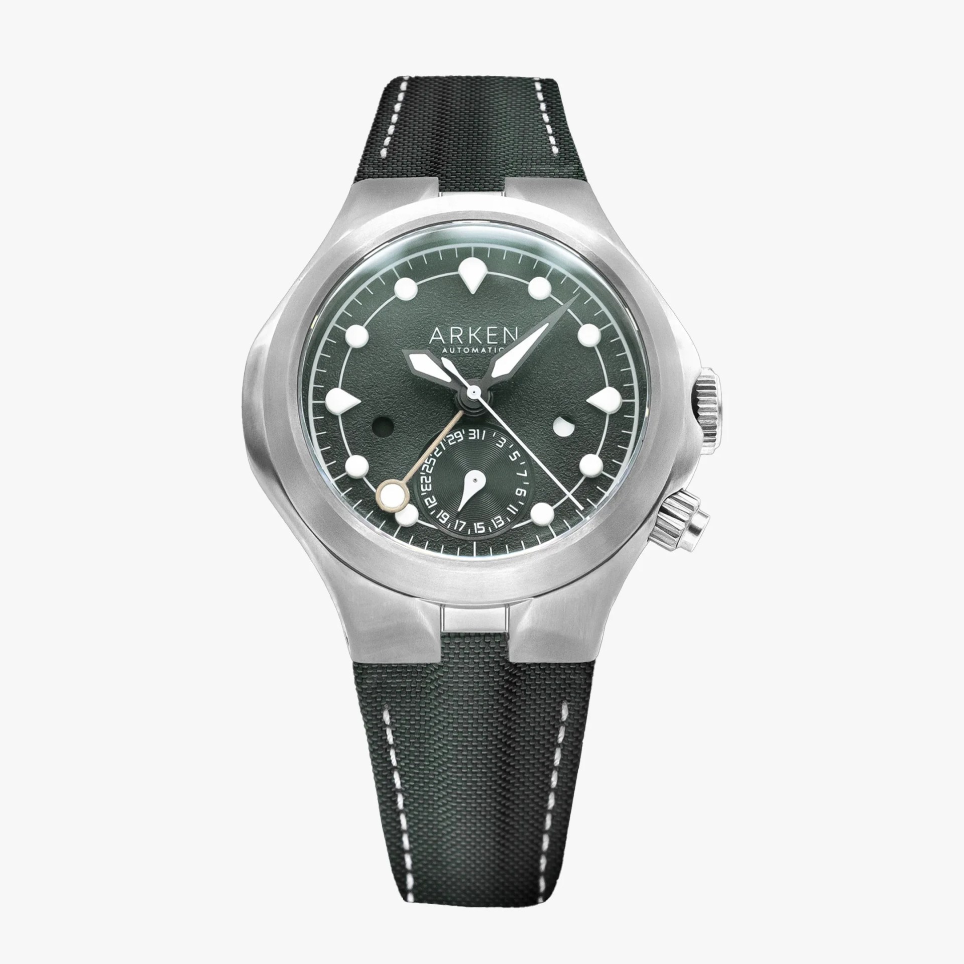 Titanium wristwatch with green textured dial, white markers, and green fabric strap with white stitching.