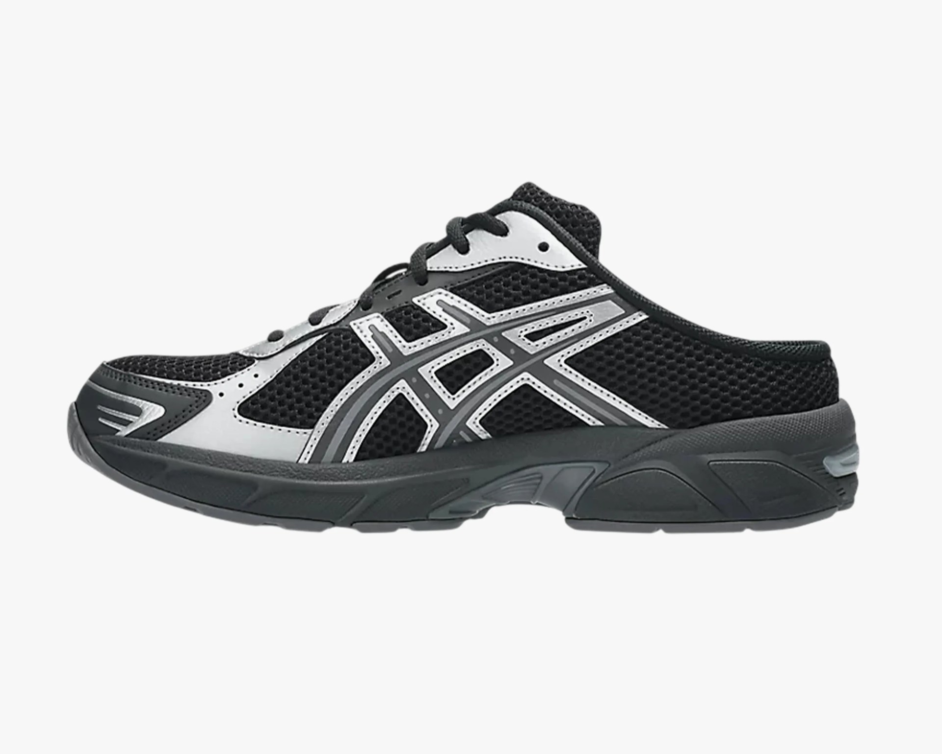 Black and gray mesh slip-on sneaker with white and gray accents and a thick sole.
