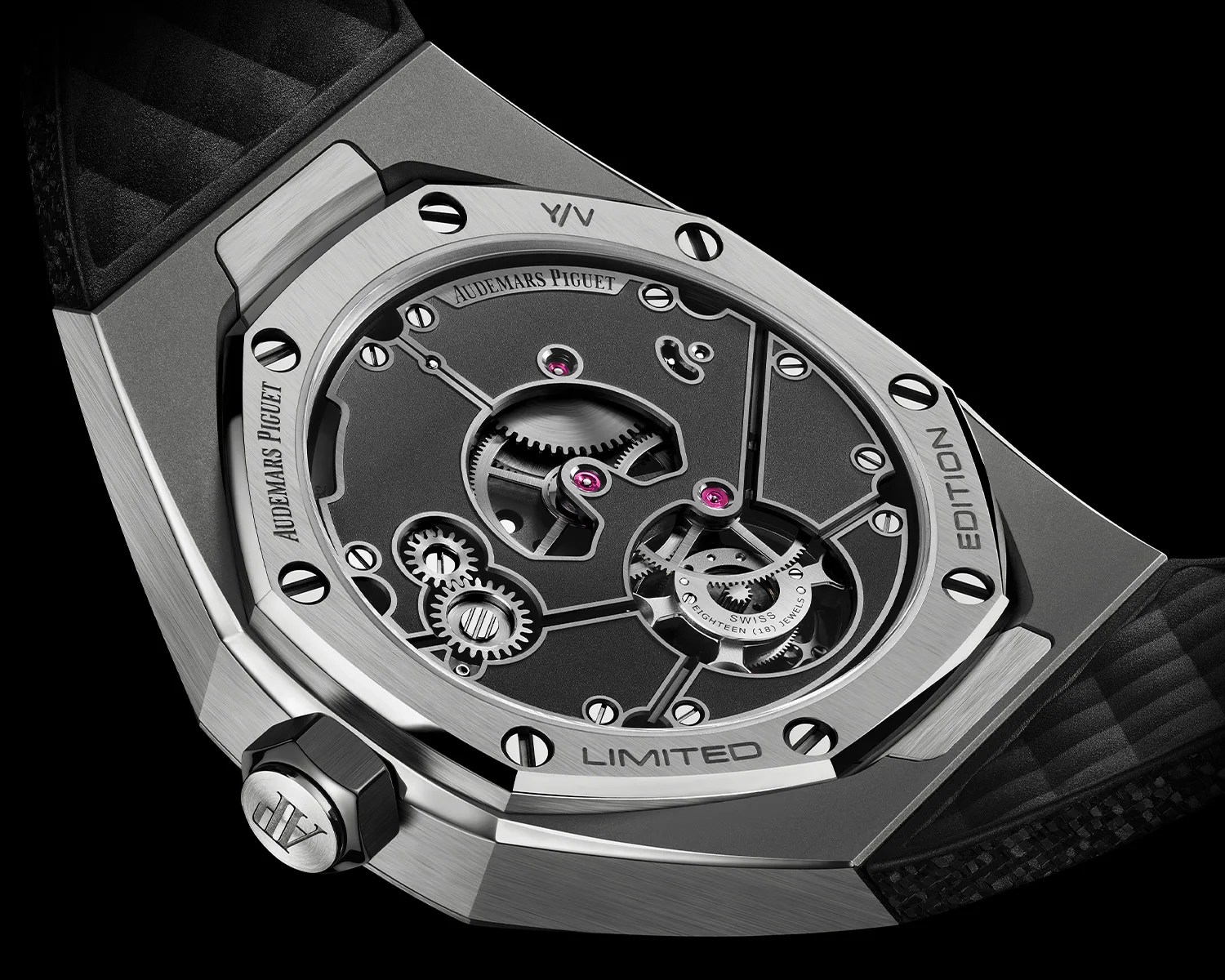 Close-up of the back of an Audemars Piguet limited edition watch showing its mechanical movement with visible gears and jewels.