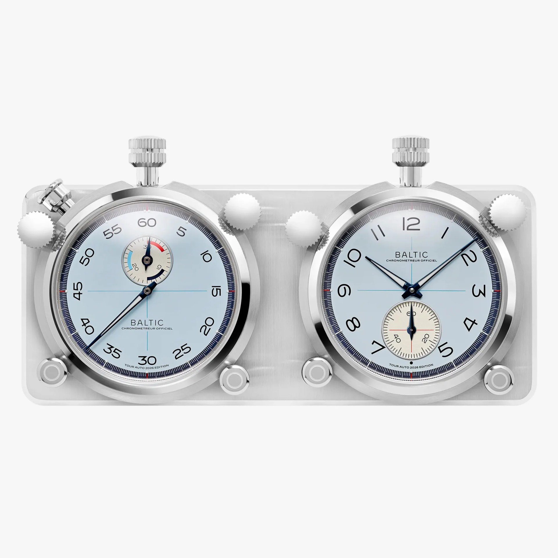 Dual silver chronometer dials with blue hands and light blue faces mounted on a rectangular metal base.