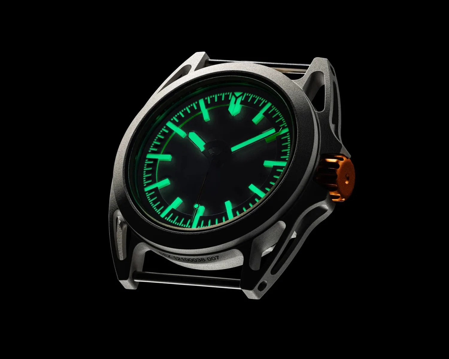 Watch case with glowing green hour markers and hands, featuring a matte gray finish and an orange crown.