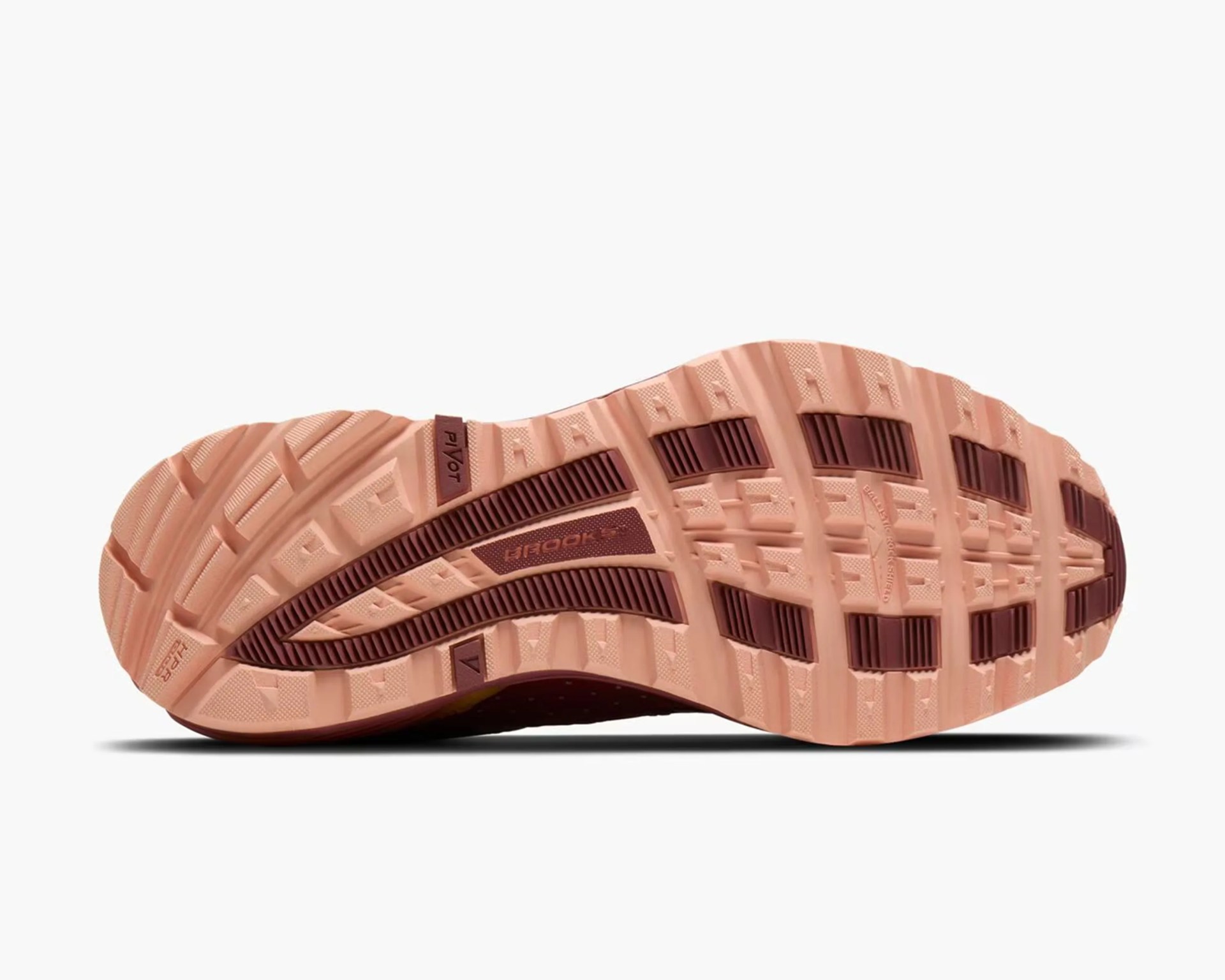Light pink and maroon textured rubber outsole of a running shoe with "Pivot" and "Brooks" branding.