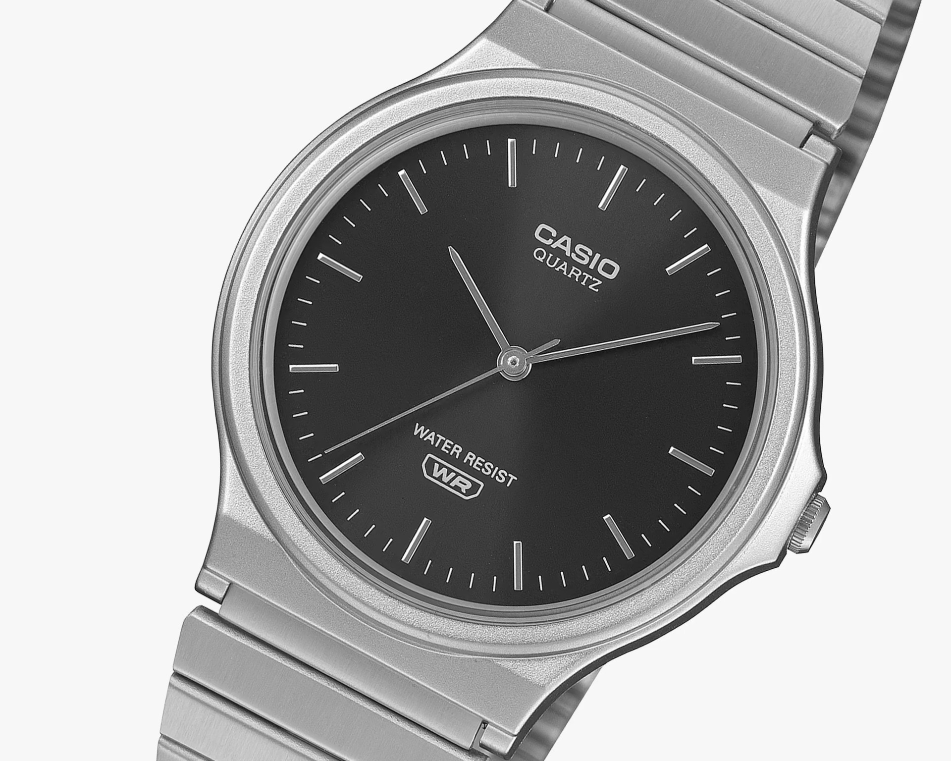 Silver Casio quartz wristwatch with black dial and metal link band.