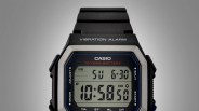 Digital Casio watch face with vibration alarm, 10-year battery, and black resin strap.