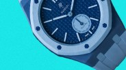 Blue AP x Swatch Royal Pop watch with textured dial and octagonal bezel on a blue strap.