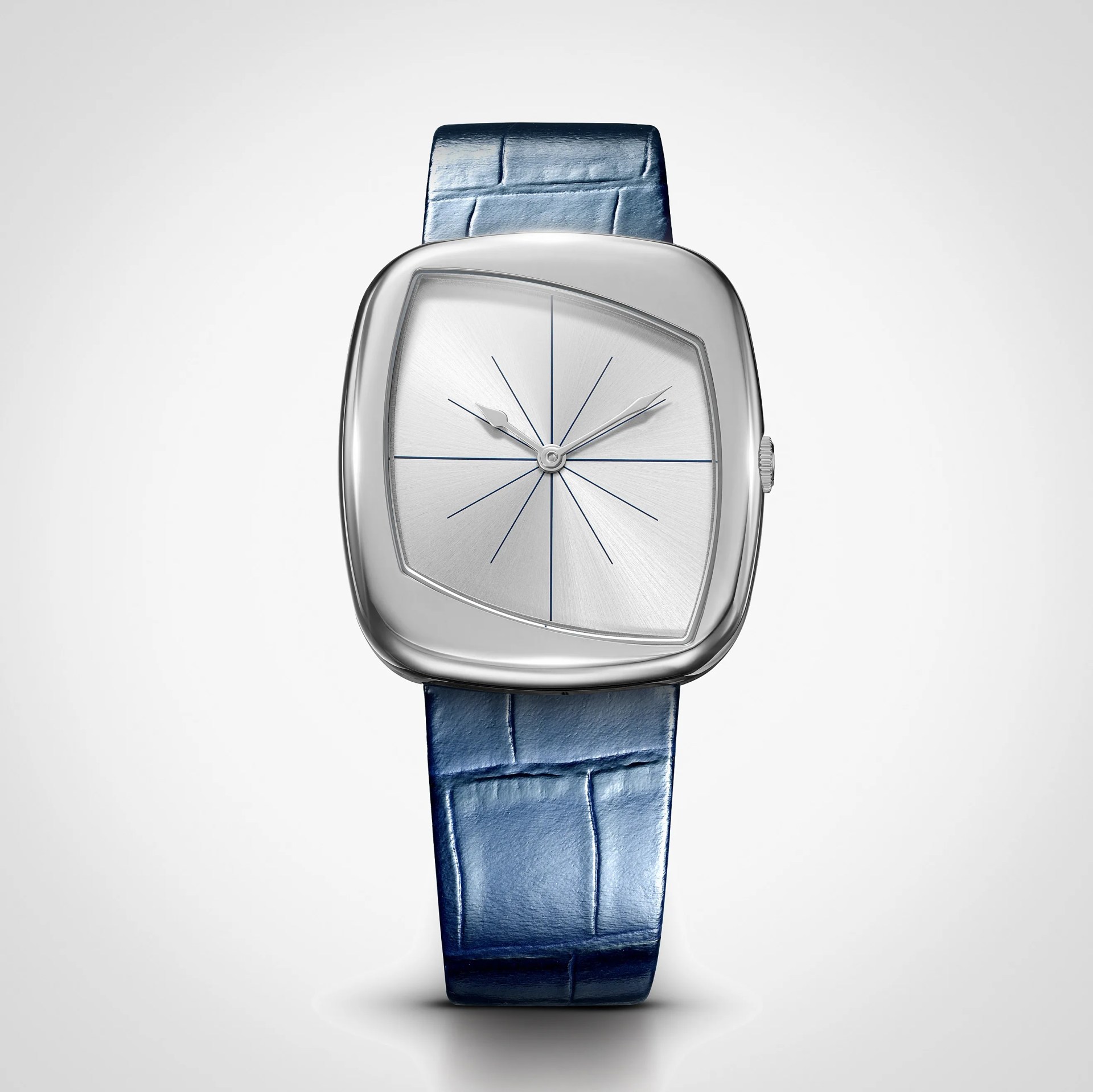 Silver watch with a unique asymmetrical square face and blue alligator leather strap.