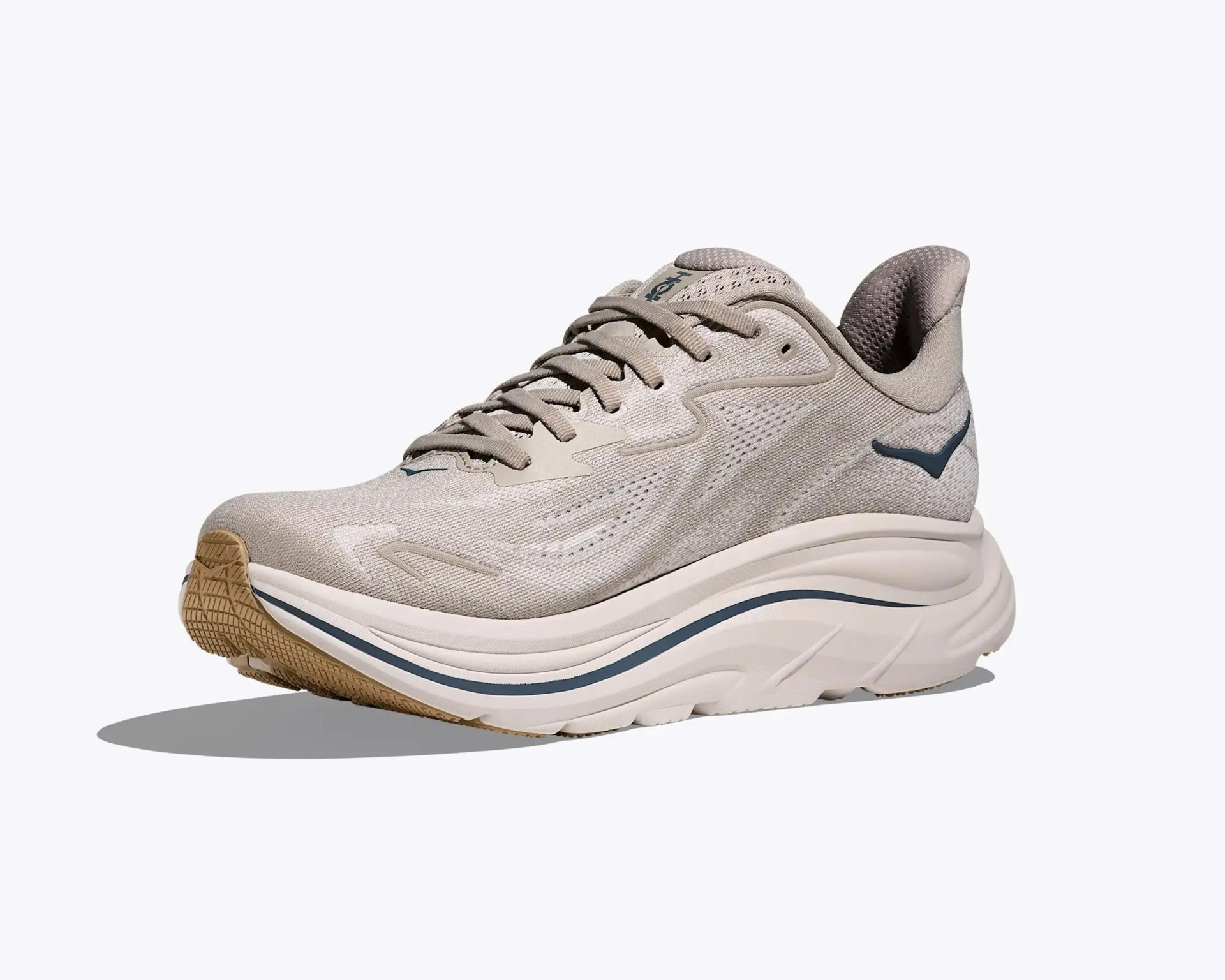 Light beige running shoe with thick white sole and blue accent stripe on the side.