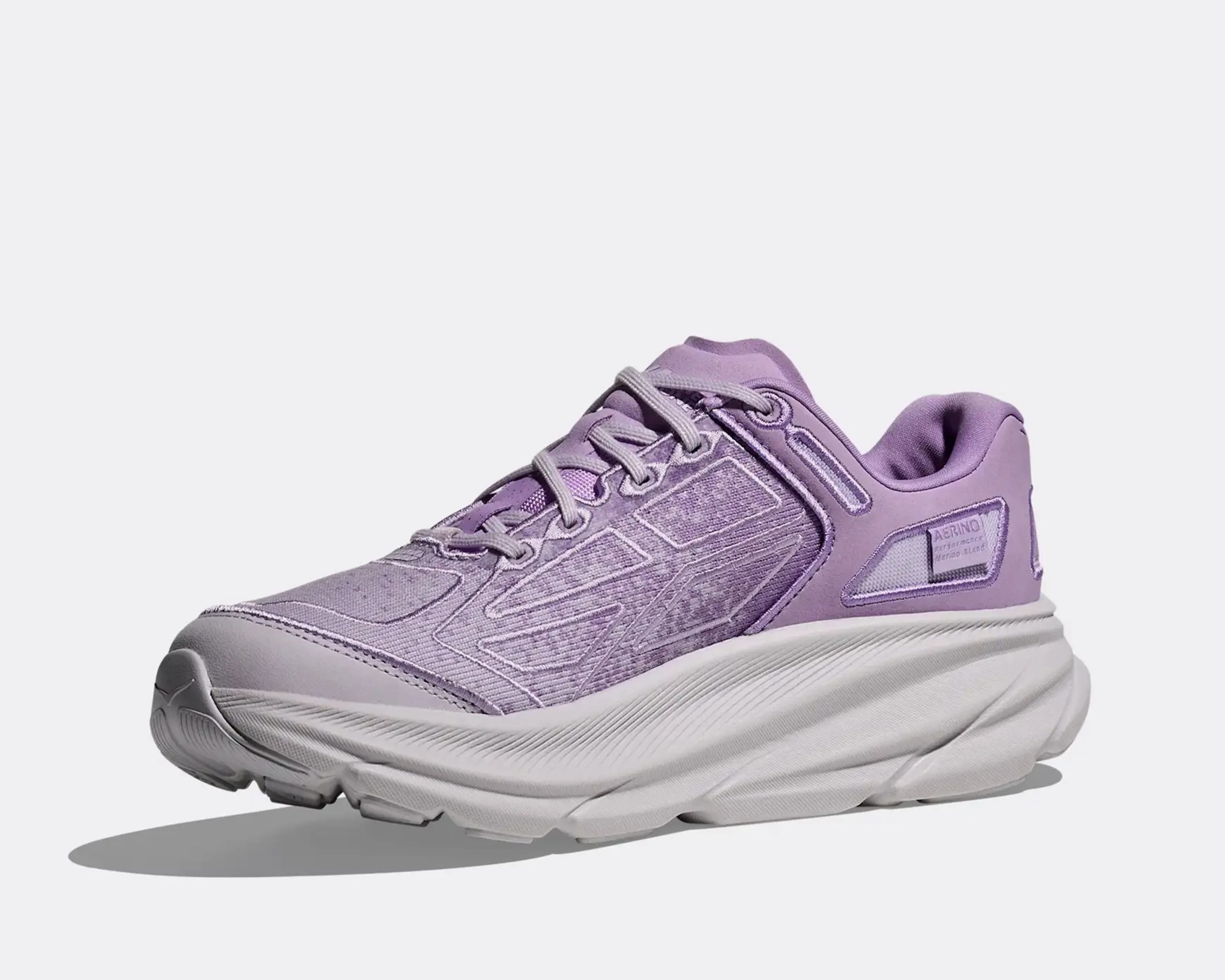 Lavender athletic shoe with mesh upper and thick white sole, featuring "AERINO" label on the side.