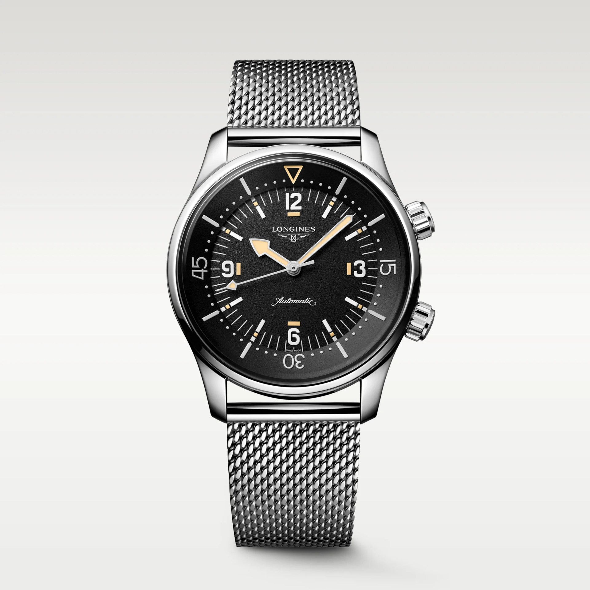 Silver mesh stainless steel wristwatch with black dial and luminous hands and markers.