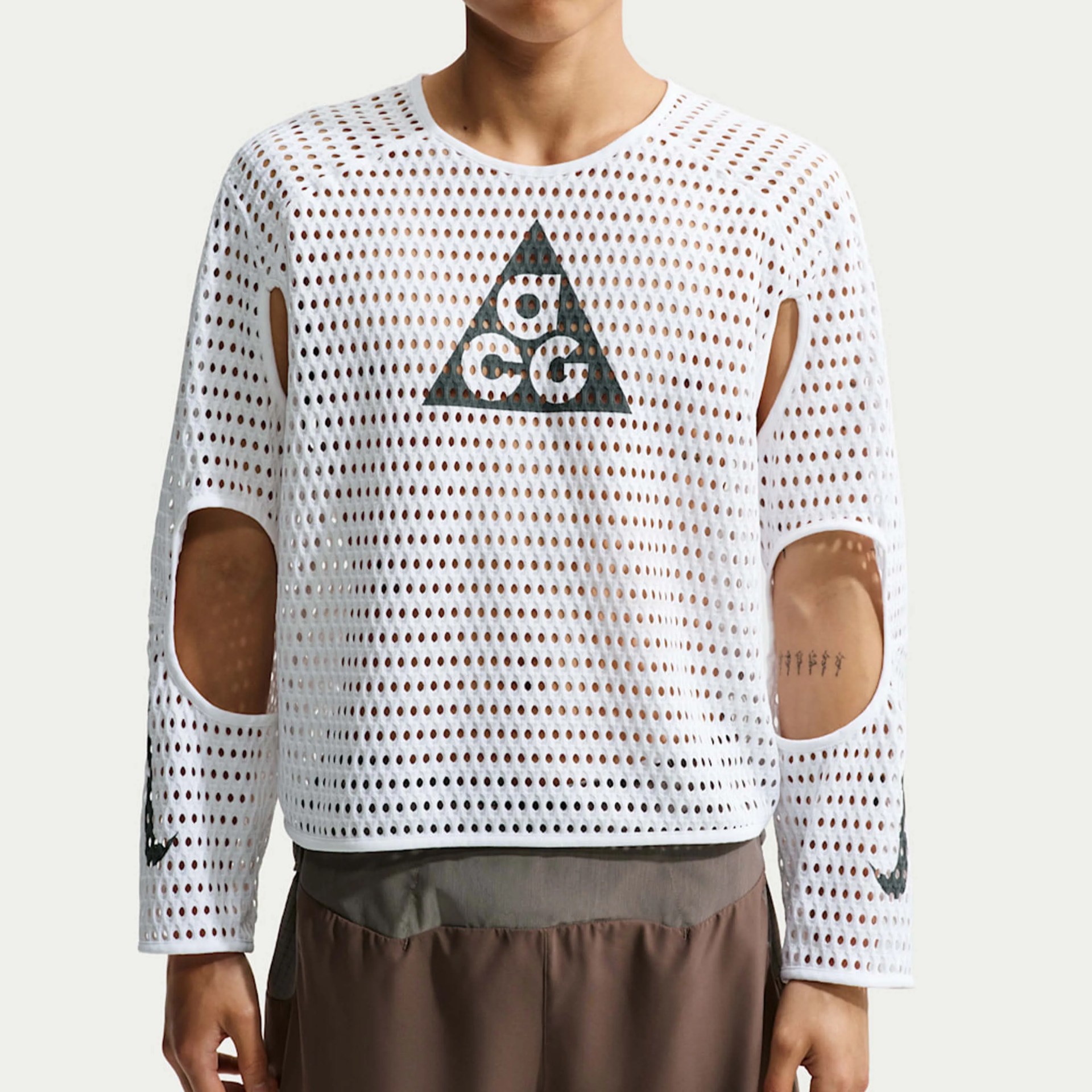 White mesh long-sleeve crop top with black triangle logo and cutouts on elbows.