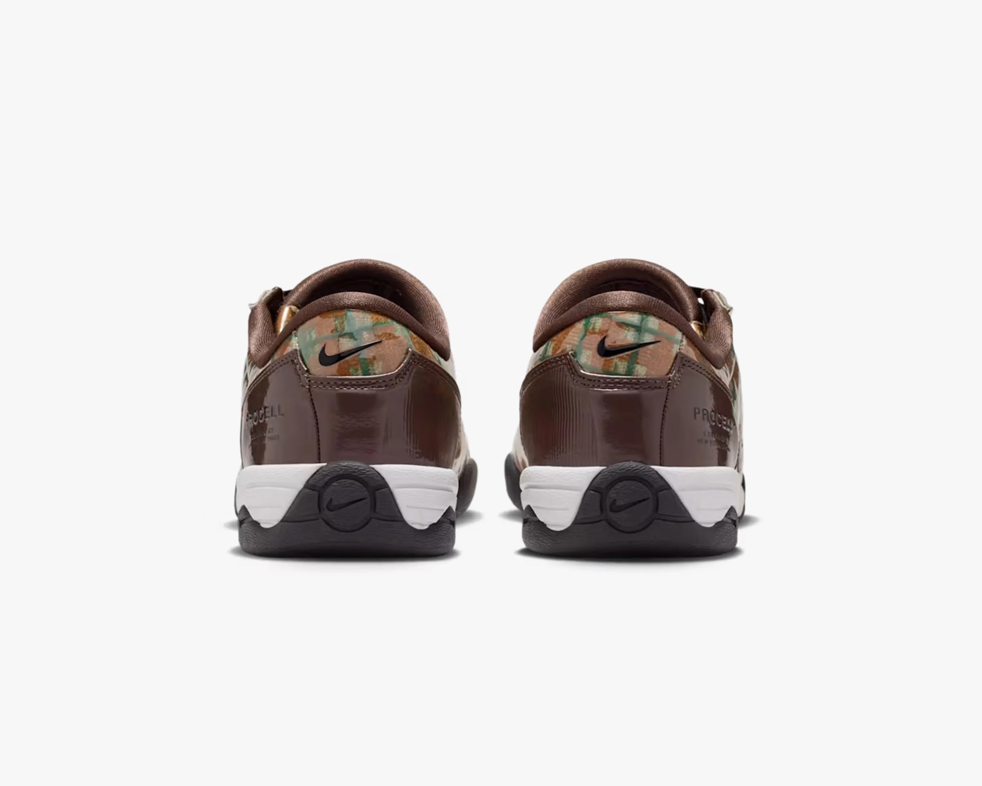 Pair of brown Nike sneakers with multicolor patterned heel collar and white midsoles viewed from the back.