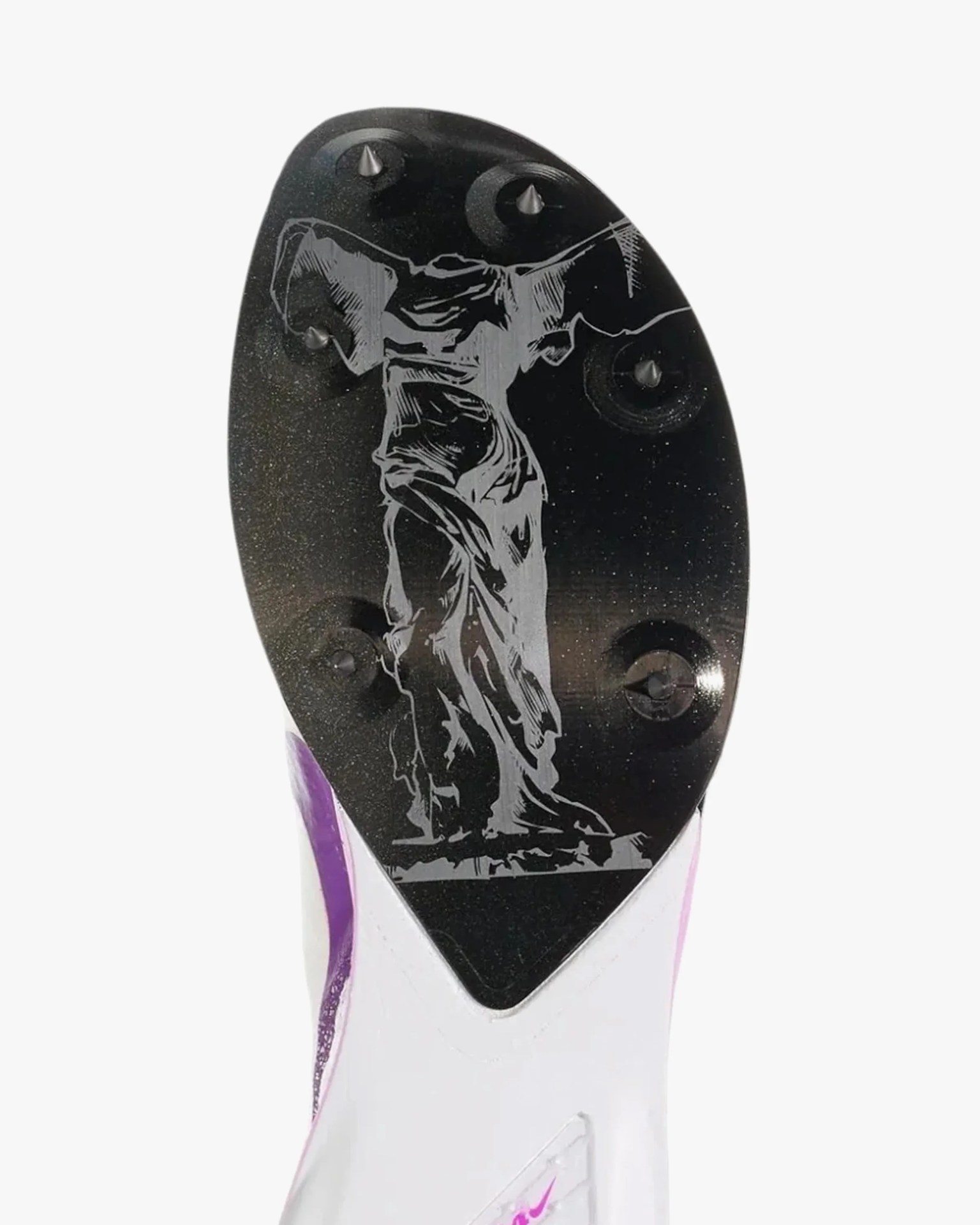 Black cleat sole with silver etched design of a draped statue figure and six metal spikes.