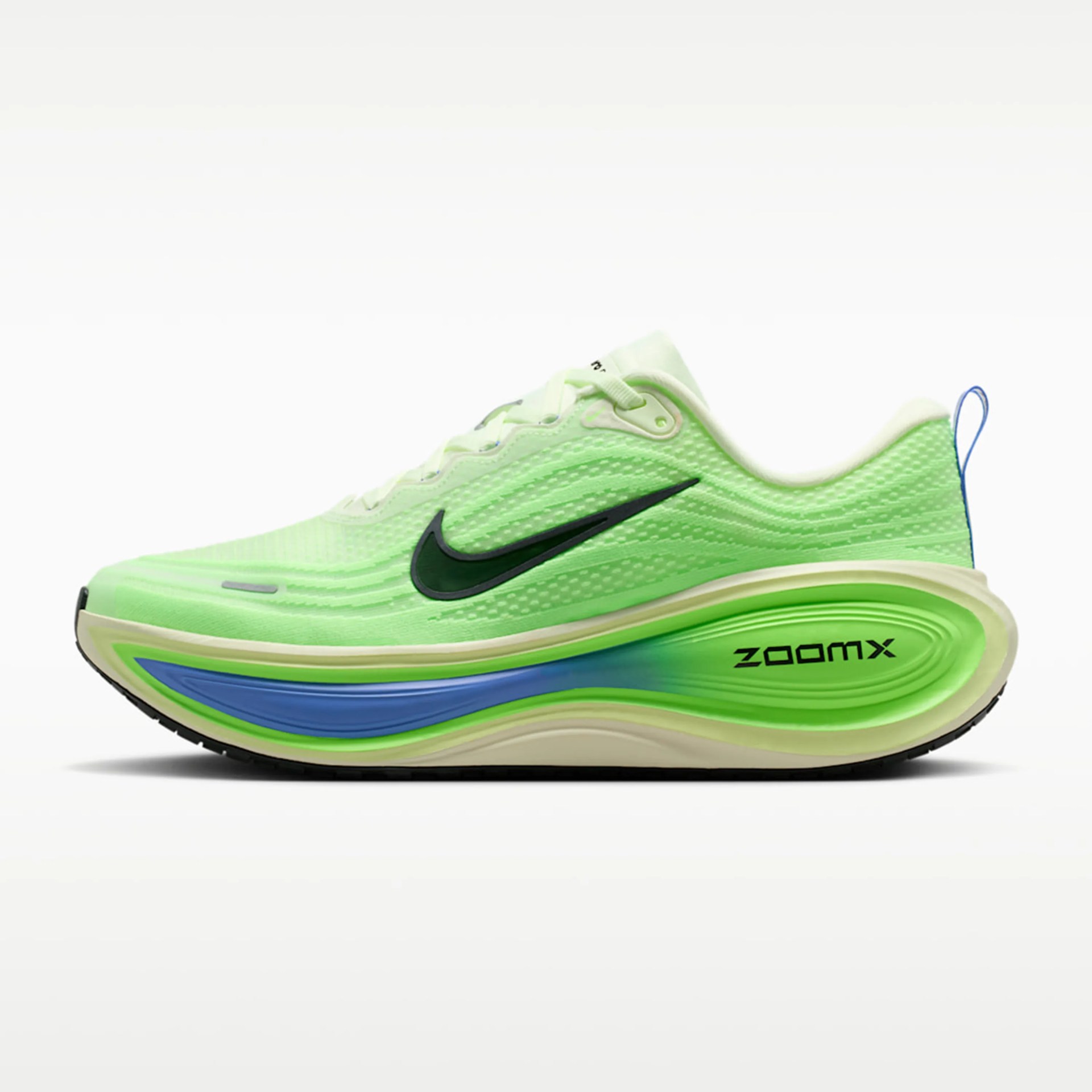 Light green Nike ZoomX running shoe with black swoosh and blue and green sole accents.