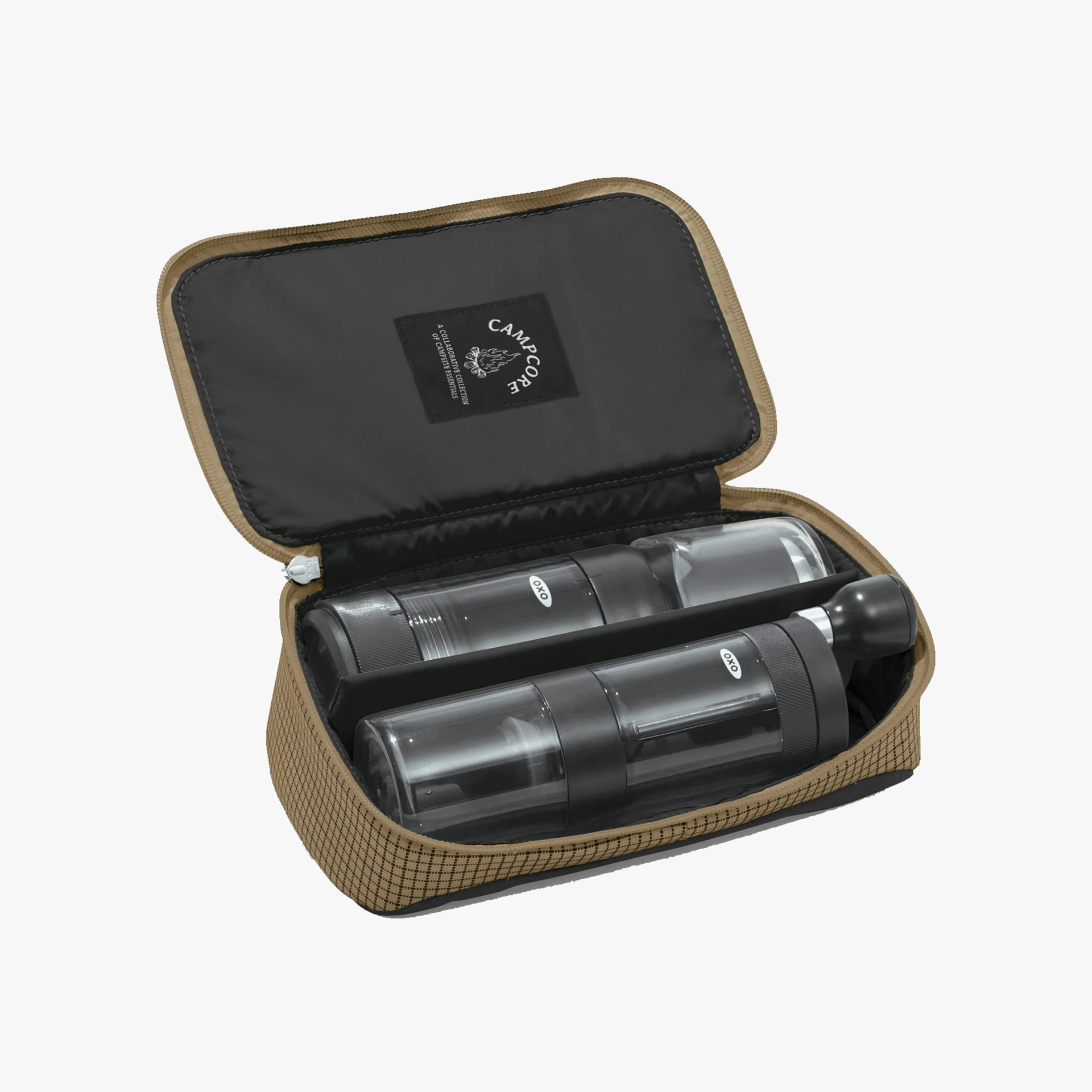 Tan and black zippered carrying case with two black OXO branded pepper or spice grinders inside.