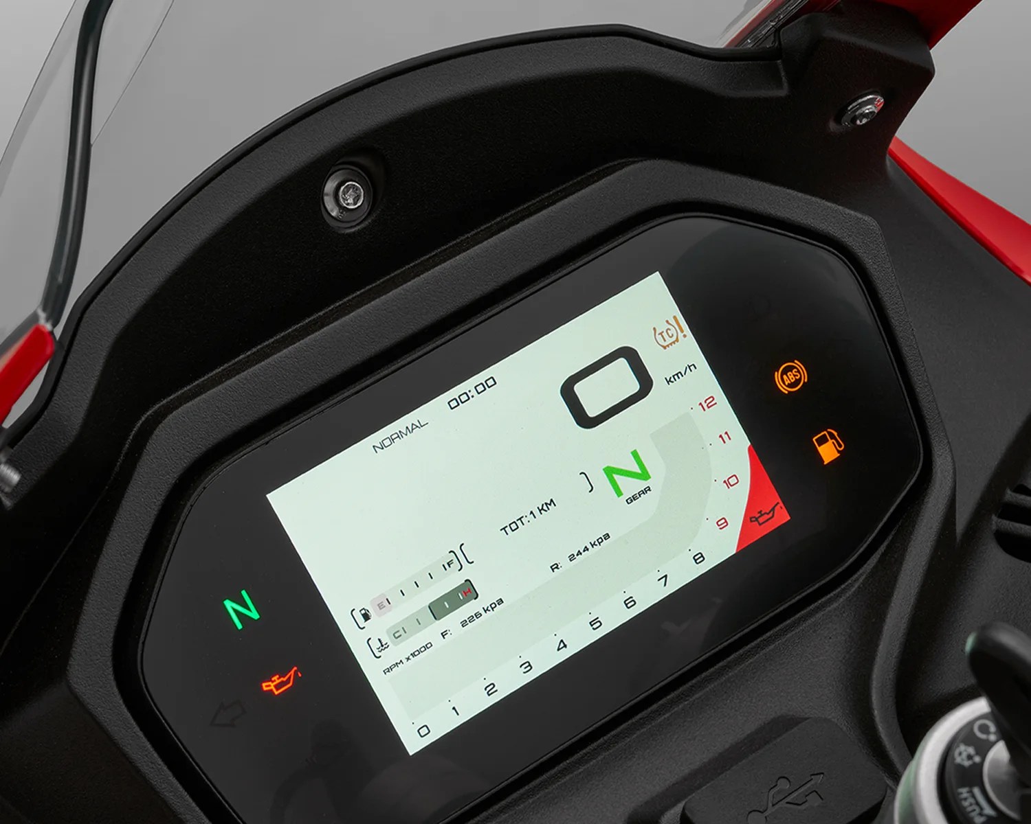 Motorcycle digital dashboard display showing neutral gear, speedometer, and warning indicators.