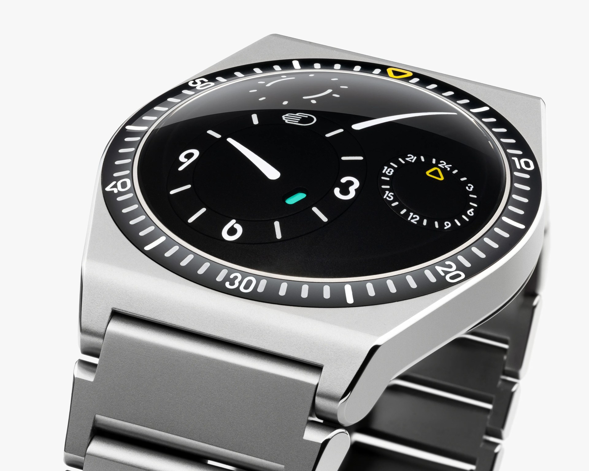 Silver metal wristwatch with a black dial featuring white and yellow markings and a unique circular time display.