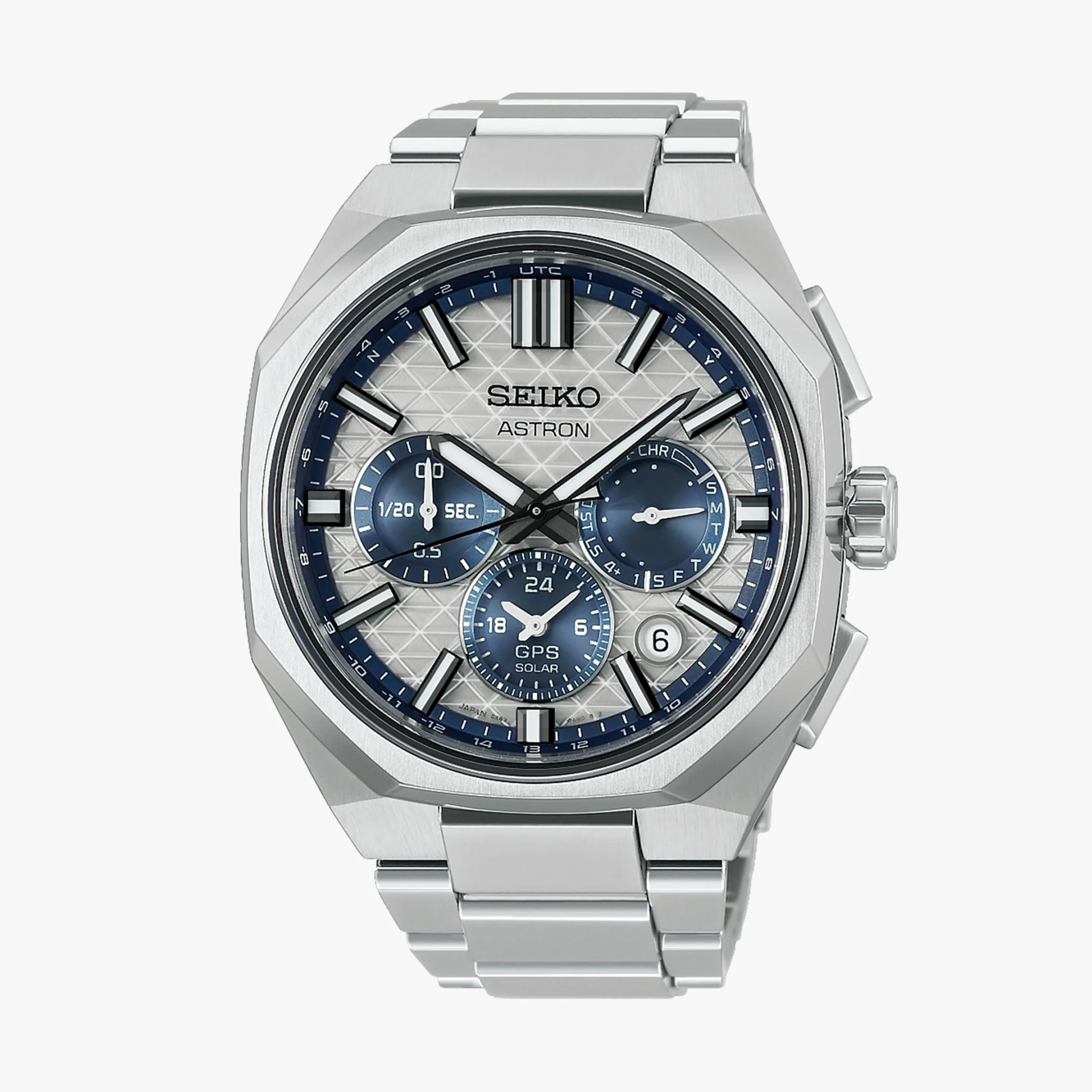 Silver Seiko Astron GPS Solar watch with blue subdials and geometric patterned face on a metal bracelet.