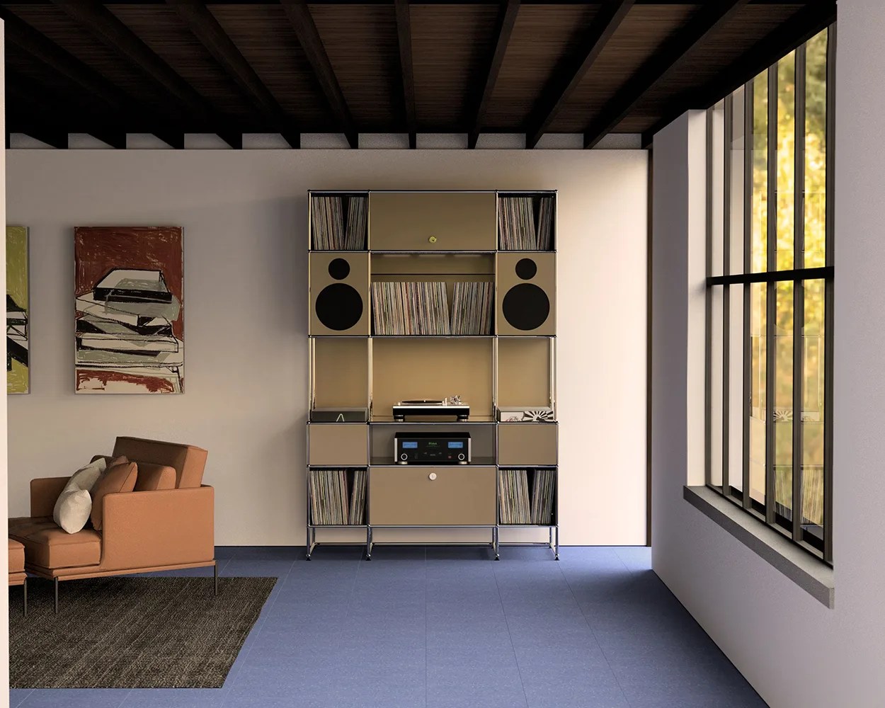 Beige modular shelving unit with vinyl records, speakers, and audio equipment against a white wall in a room with blue tile floor and large window.