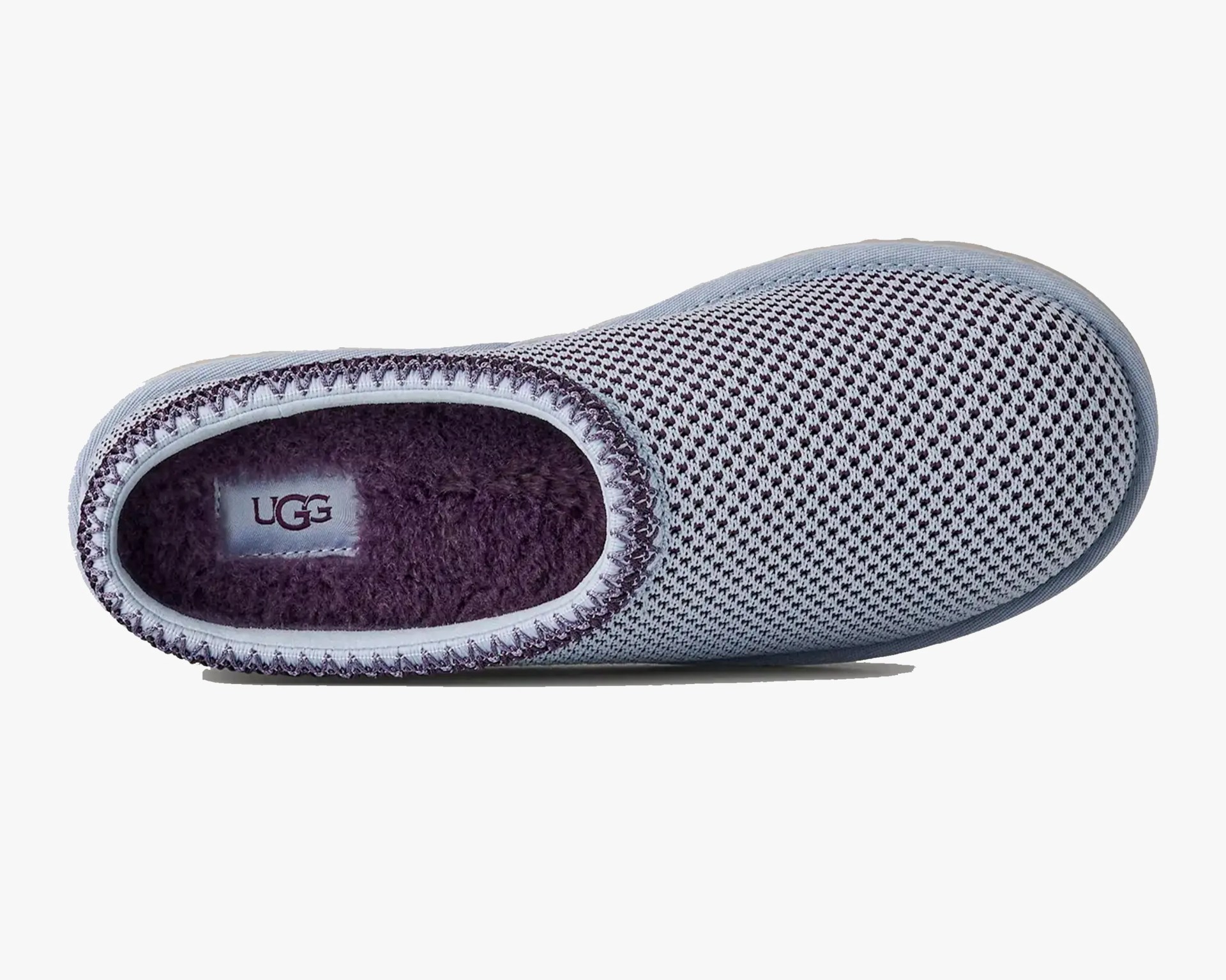 Light gray and dark purple knit UGG slipper with plush interior lining.