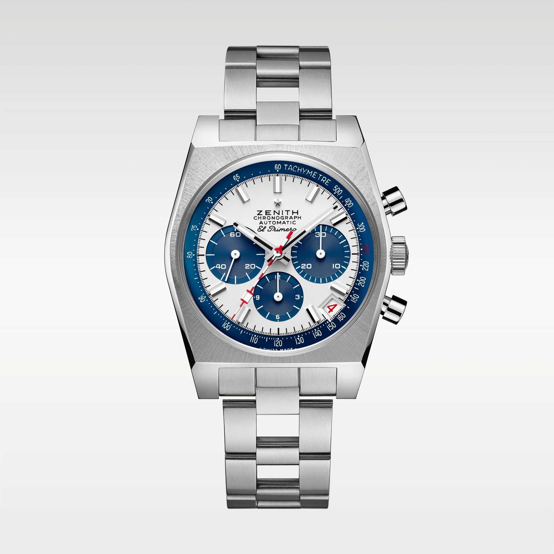 Stainless steel Zenith El Primero chronograph watch with a white dial, blue subdials, red second hand, and tachymeter scale.