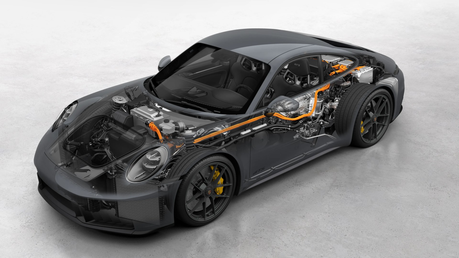 Dark gray Porsche 911 GTS with transparent body showing internal electric and mechanical components and orange wiring.