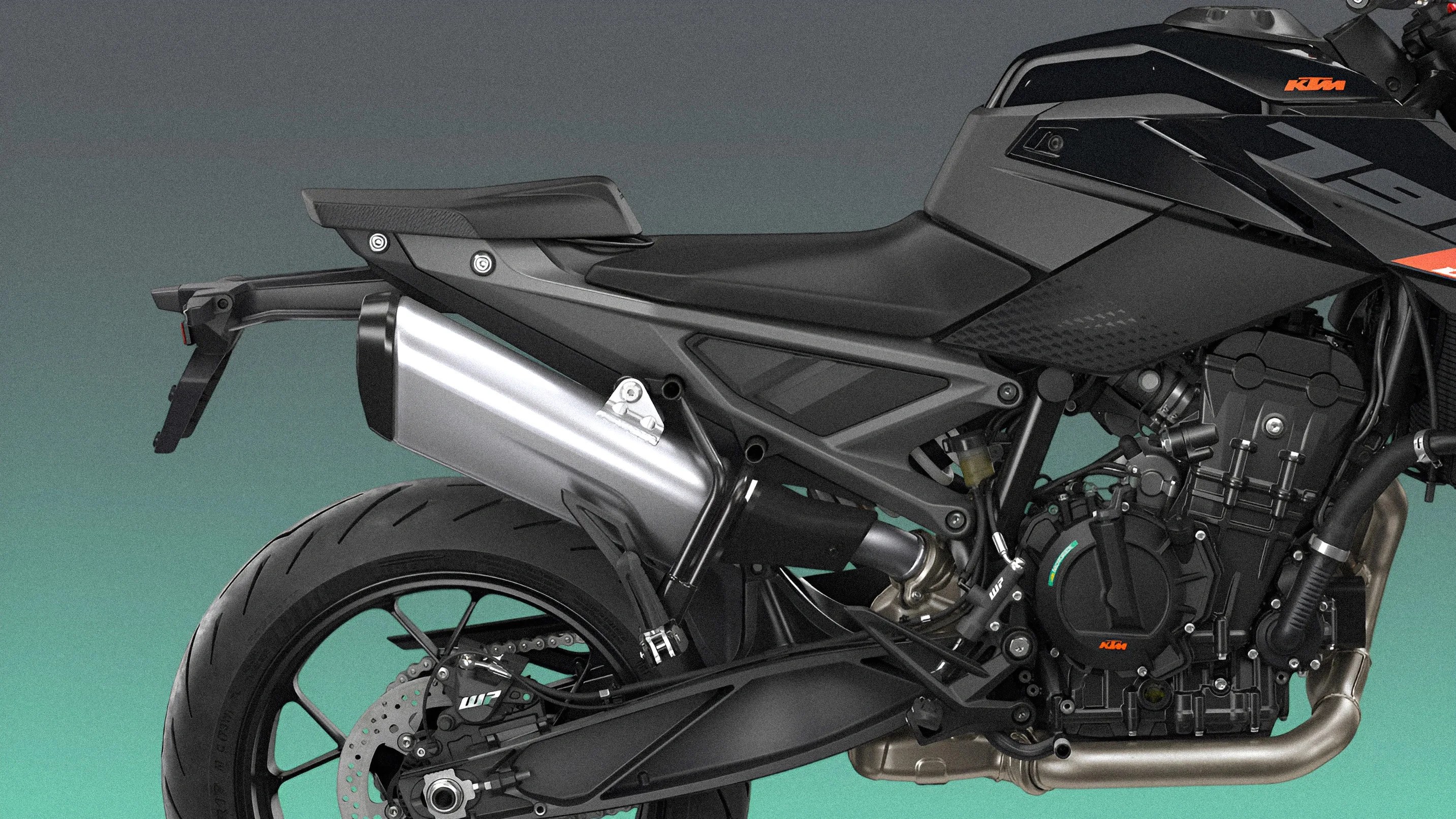 Close-up of the rear and middle section of a black KTM motorcycle showing the exhaust, seat, rear wheel, and engine components.