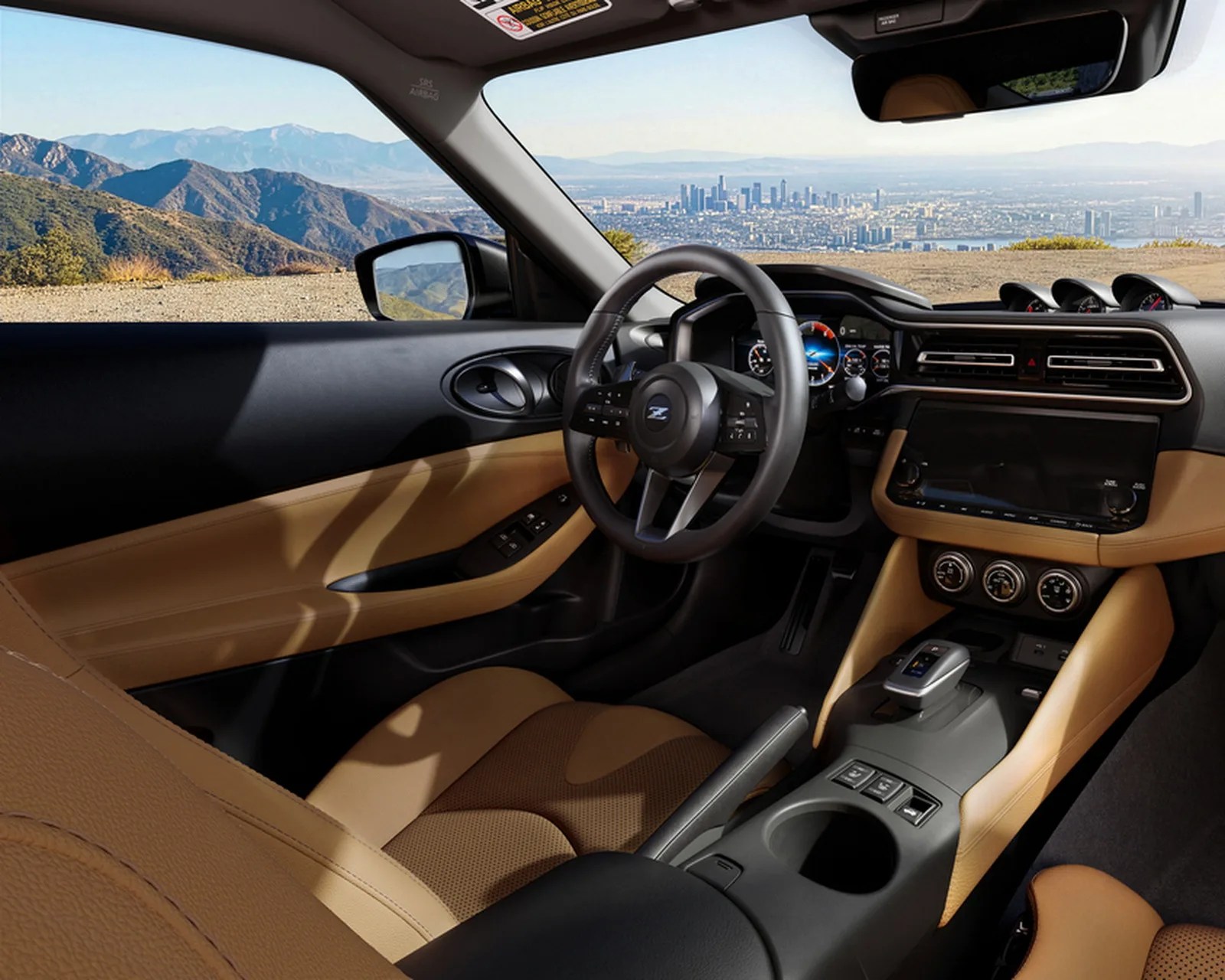 Car interior with tan leather seats, black dashboard, digital instrument cluster, and cityscape visible through the window.