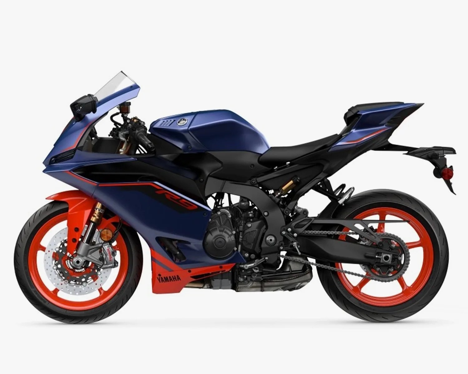 Blue and orange Yamaha R7 sport motorcycle with orange wheels on a white background.