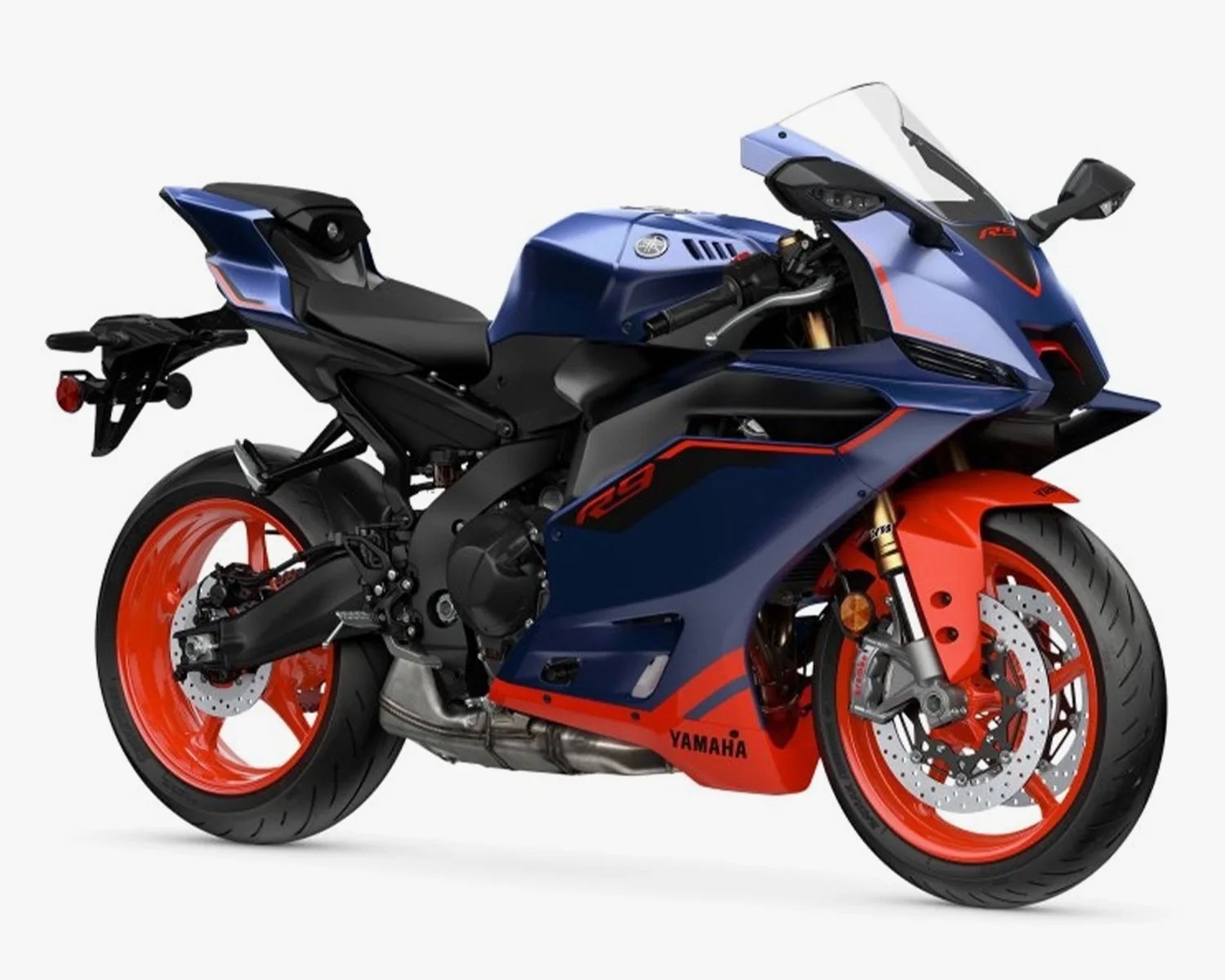 Blue and orange Yamaha R9 sport motorcycle with orange wheels on a white background.