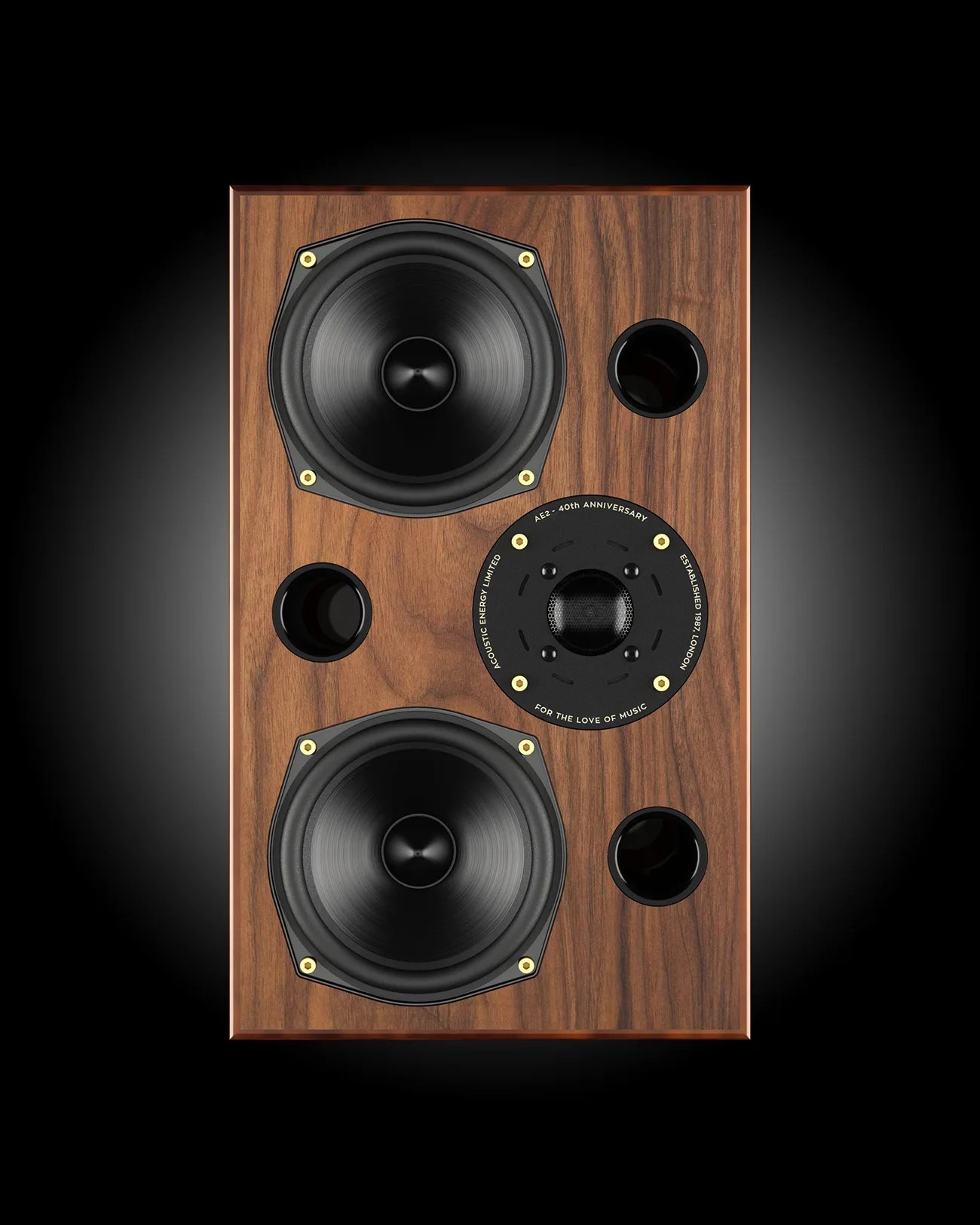 Wood-finished speaker with two large black drivers, a central tweeter, and three circular ports on a black background.