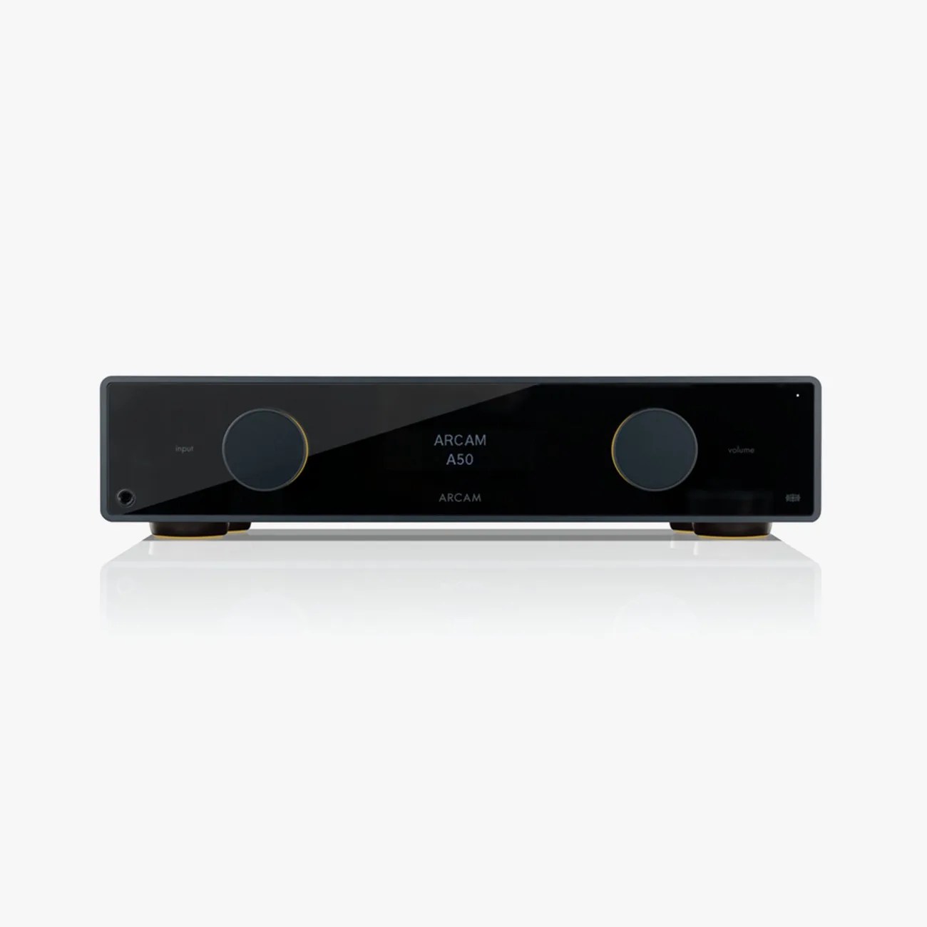 Black Arcam A50 stereo amplifier with two large control knobs and digital display on a white surface.