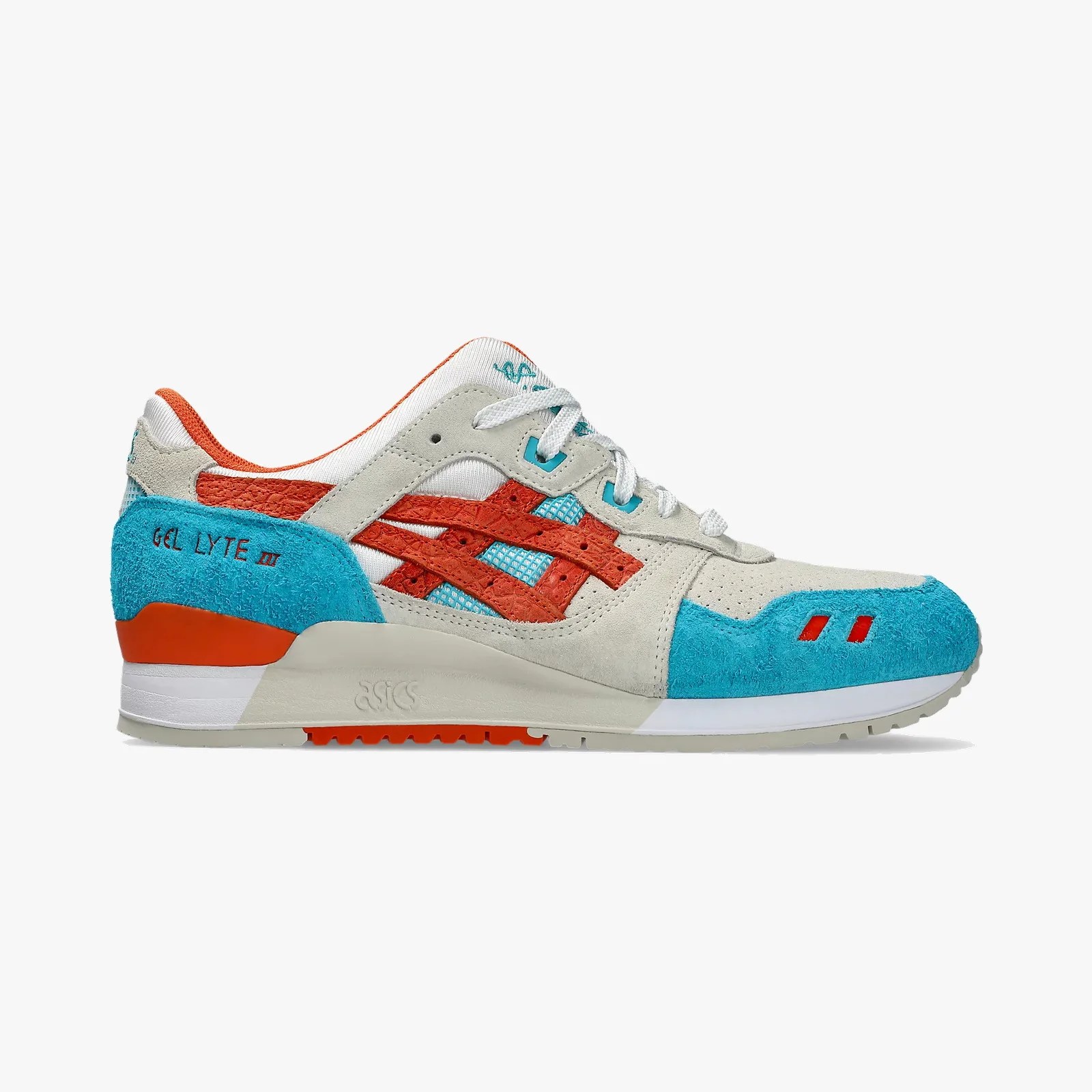 Beige, turquoise, and orange Asics Gel Lyte III sneaker with suede and mesh upper, white laces, and white sole.