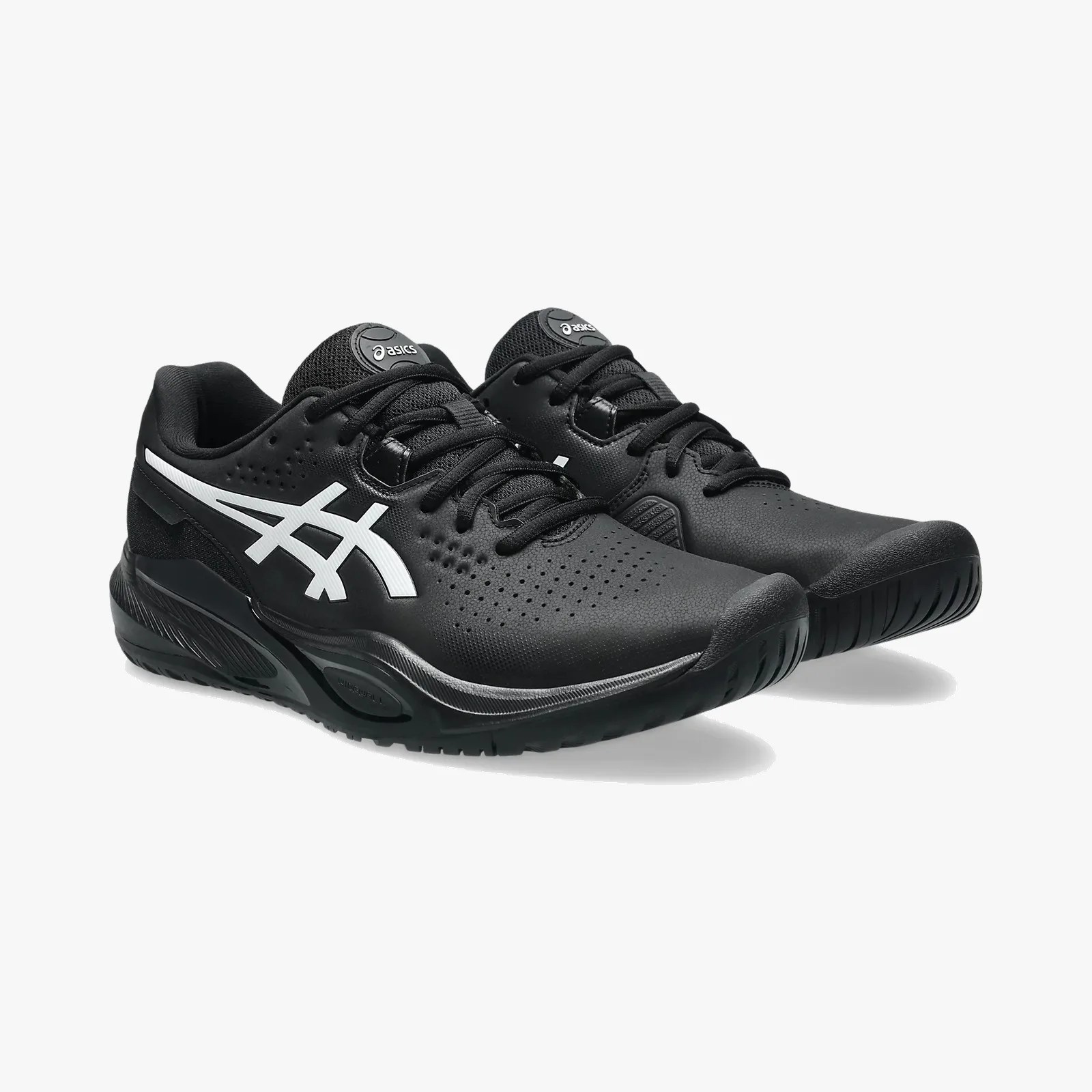 Pair of black ASICS athletic shoes with white logo and textured soles on a white background.