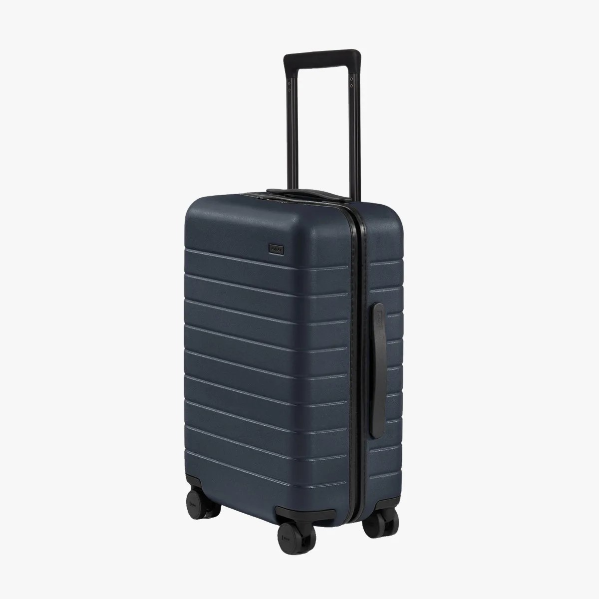 Navy blue hard-shell suitcase with black telescoping handle and four black spinner wheels.