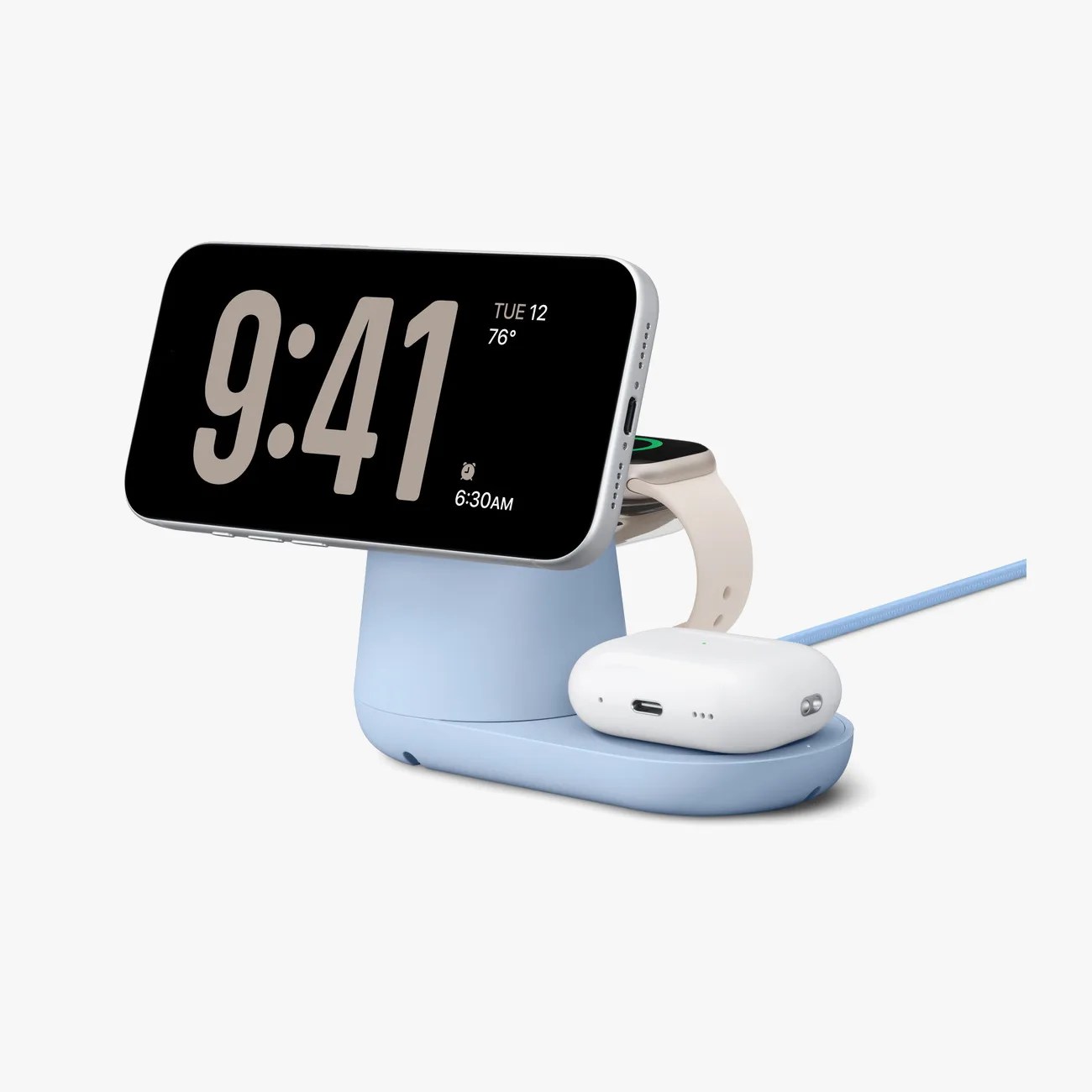 Blue wireless charging stand holding a smartphone, smartwatch, and white wireless earbuds case.