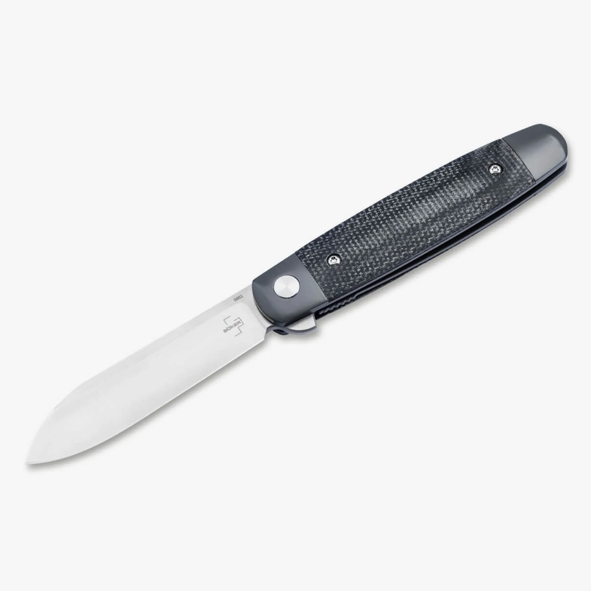 Knife with a textured black handle and a partially visible stainless steel blade on a white background.
