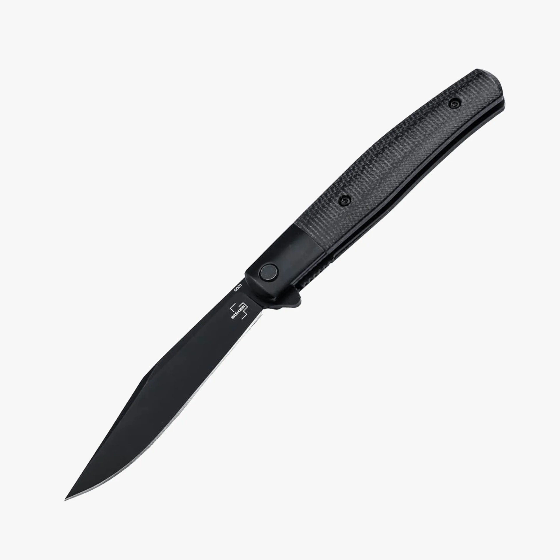 Black folding knife with textured handle and partially serrated blade on a white background.