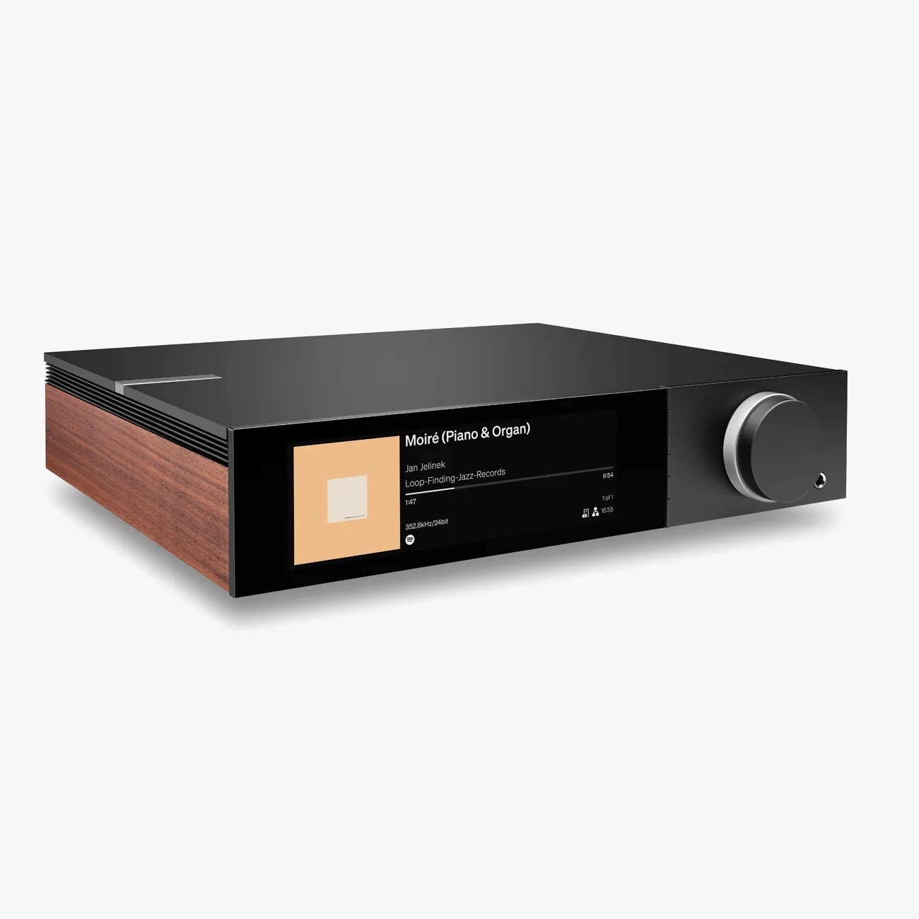 Black audio player with wooden side panels, large display showing music info, and a silver control knob on the right.