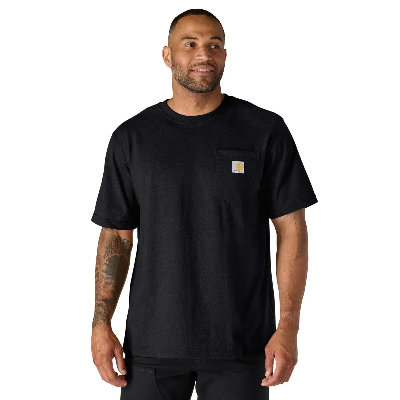 Black short-sleeve Carhartt T-shirt with chest pocket worn by a person with tattoos on their arms.